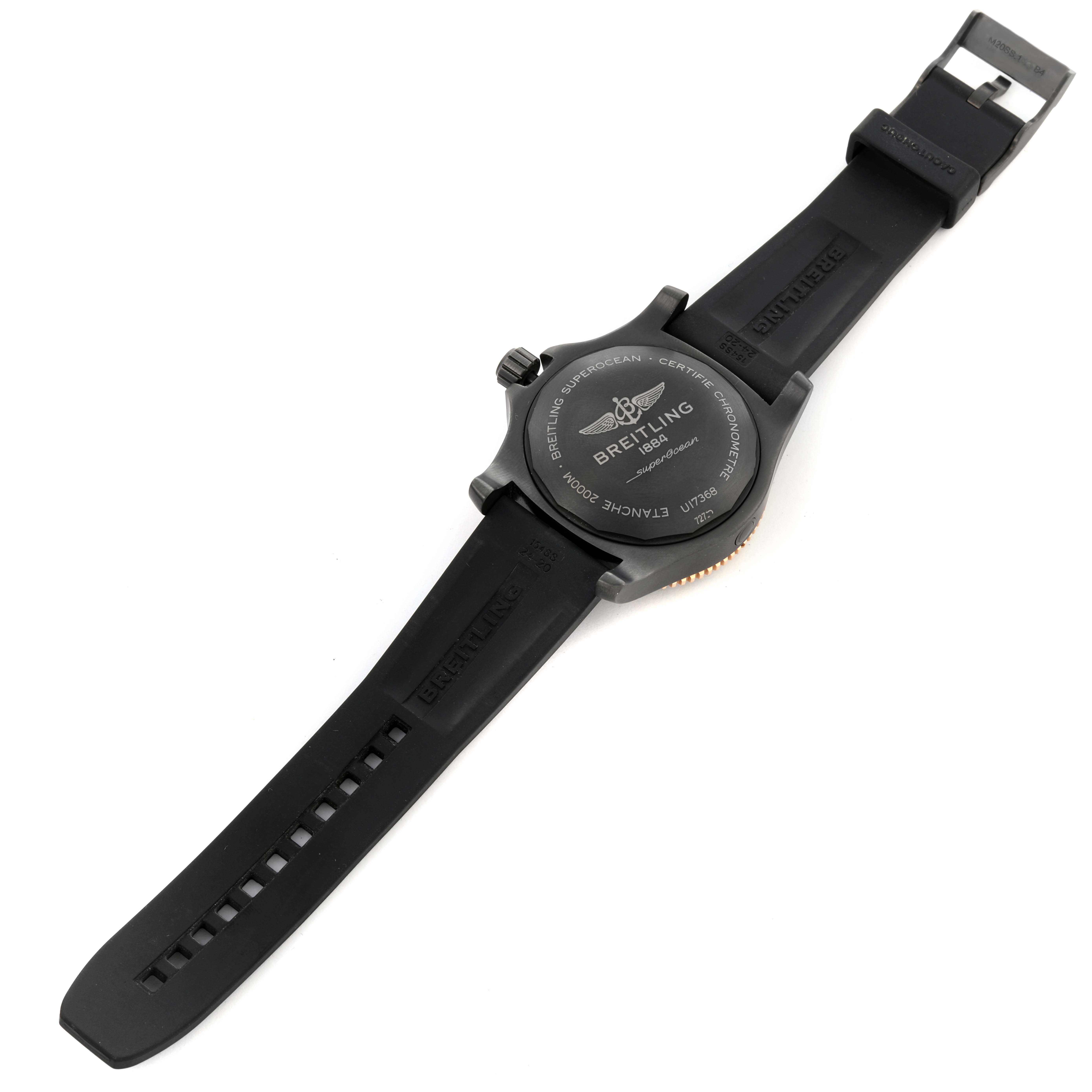 The image shows the back of a Breitling Superocean U17368 Men's Steel and Gold (two tone) Black Dial U17368 Men's Steel and Gold (two tone) Black Dial watch, highlighting the strap and buckle from a top-angle view.