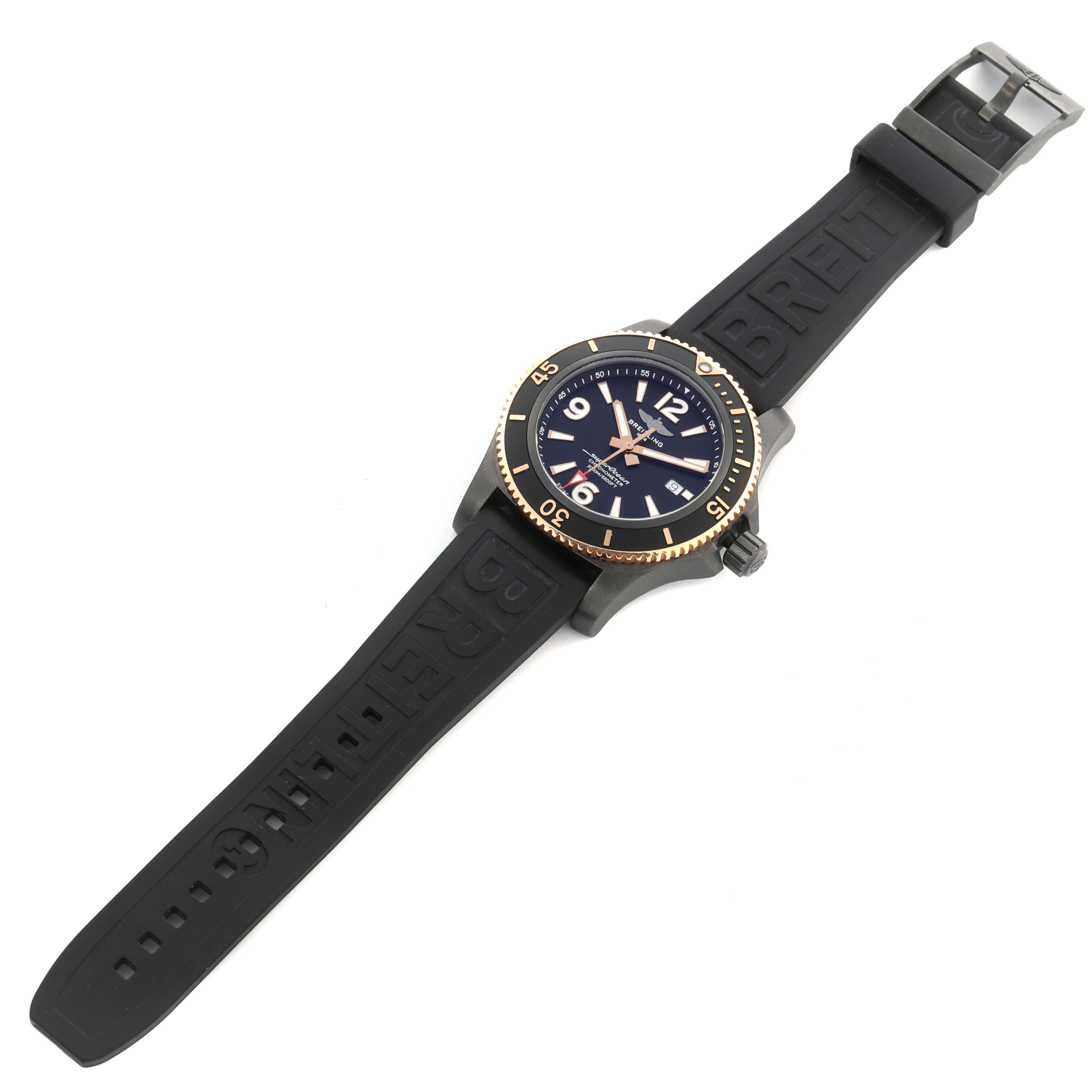The Breitling Superocean U17368 Men's Steel and Gold (two tone) Black Dial U17368 Men's Steel and Gold (two tone) Black Dial watch is shown from a top-down angle, displaying the face, bezel, and black rubber strap.