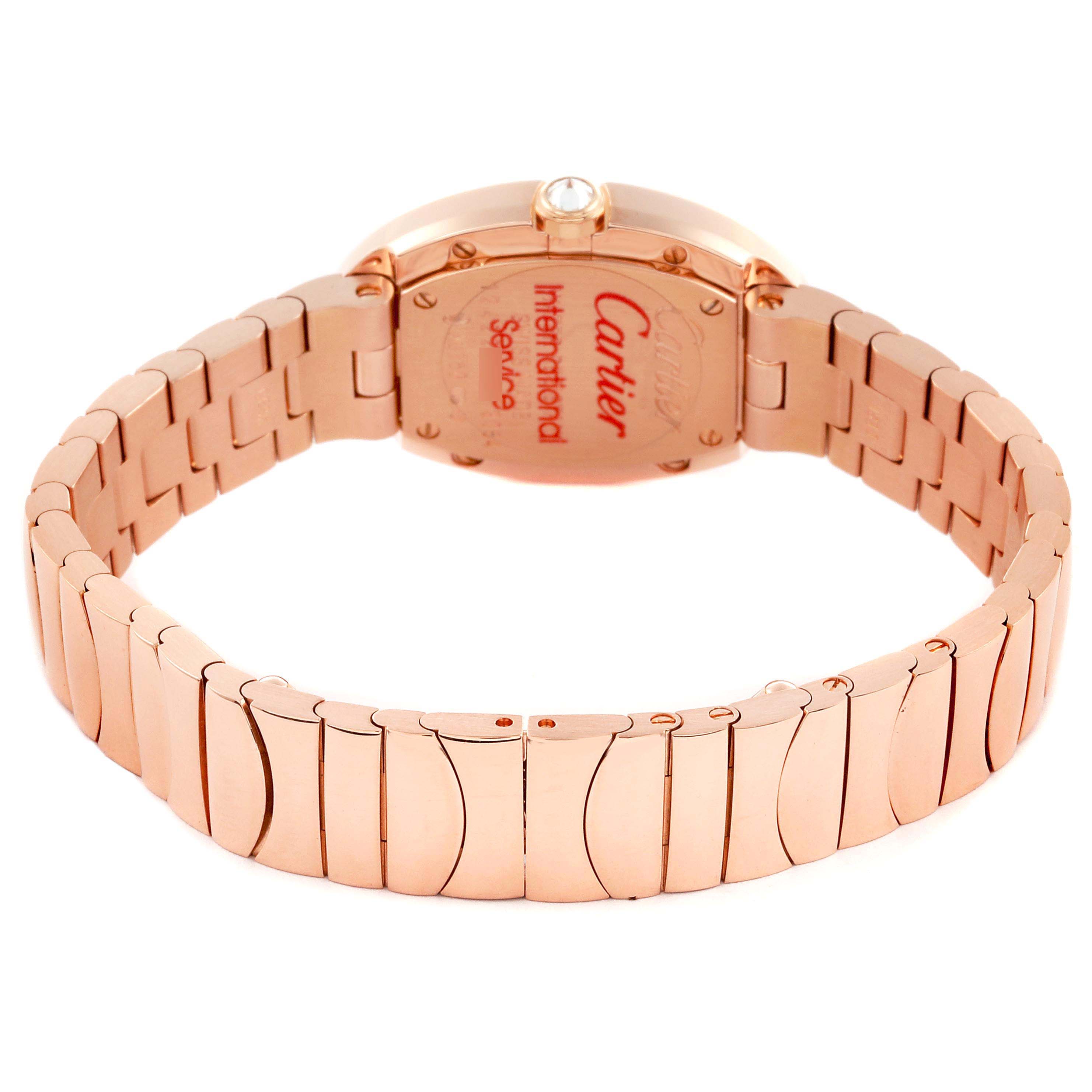 The Cartier Baignoire WB520002 Women
s Rose Gold Silver Dial WB520002 Women
s Rose Gold Silver Dial watch is viewed from the back, showing the case back and bracelet links.