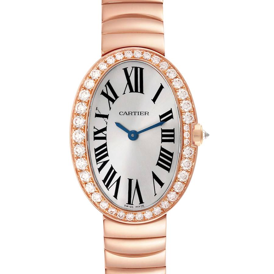 The Cartier Baignoire watch is shown from a front angle, displaying the face, bezel with diamonds, and part of the bracelet.