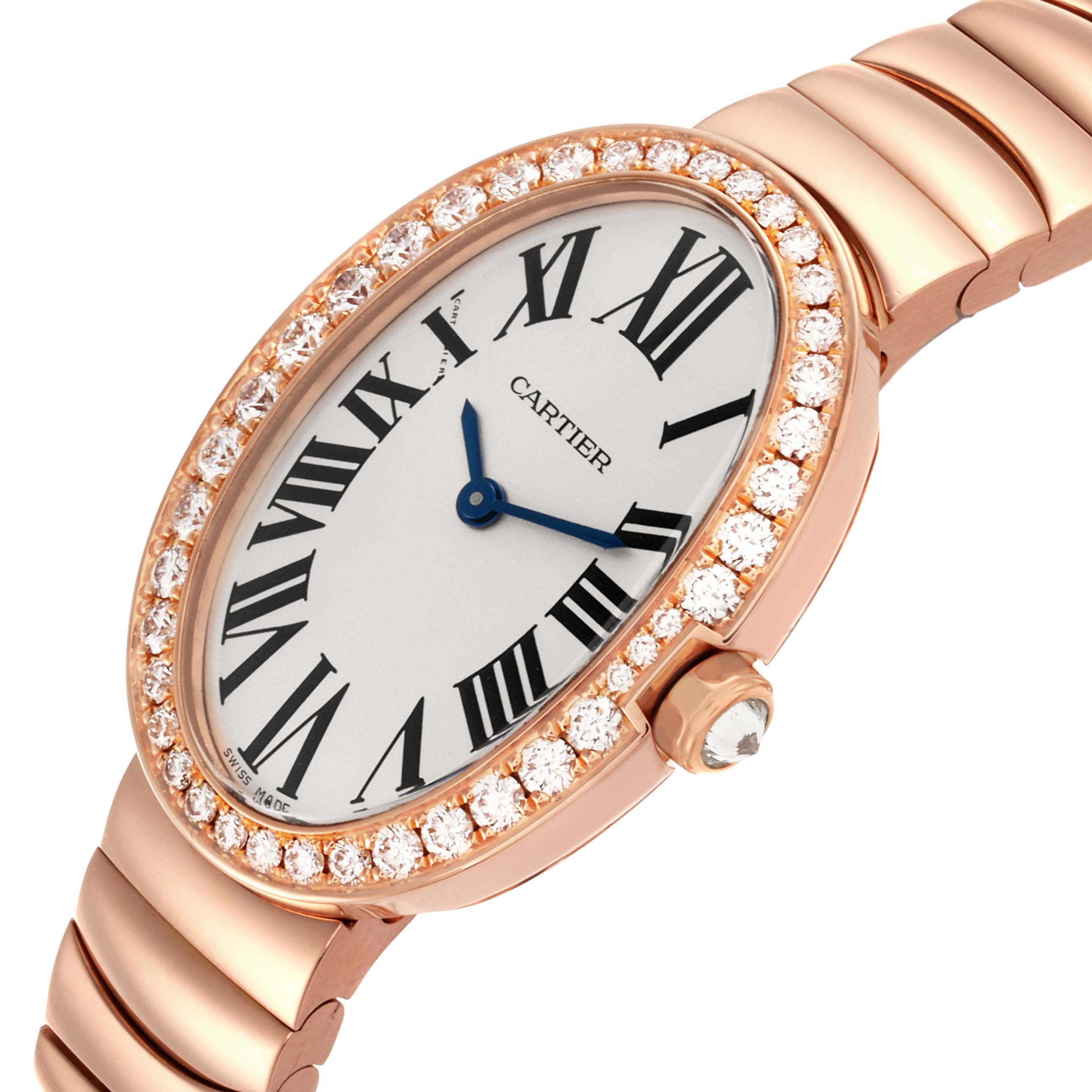 The Cartier Baignoire WB520002 Women
s Rose Gold Silver Dial WB520002 Women
s Rose Gold Silver Dial watch is shown at an angle displaying its diamond bezel, white dial, and metal bracelet.
