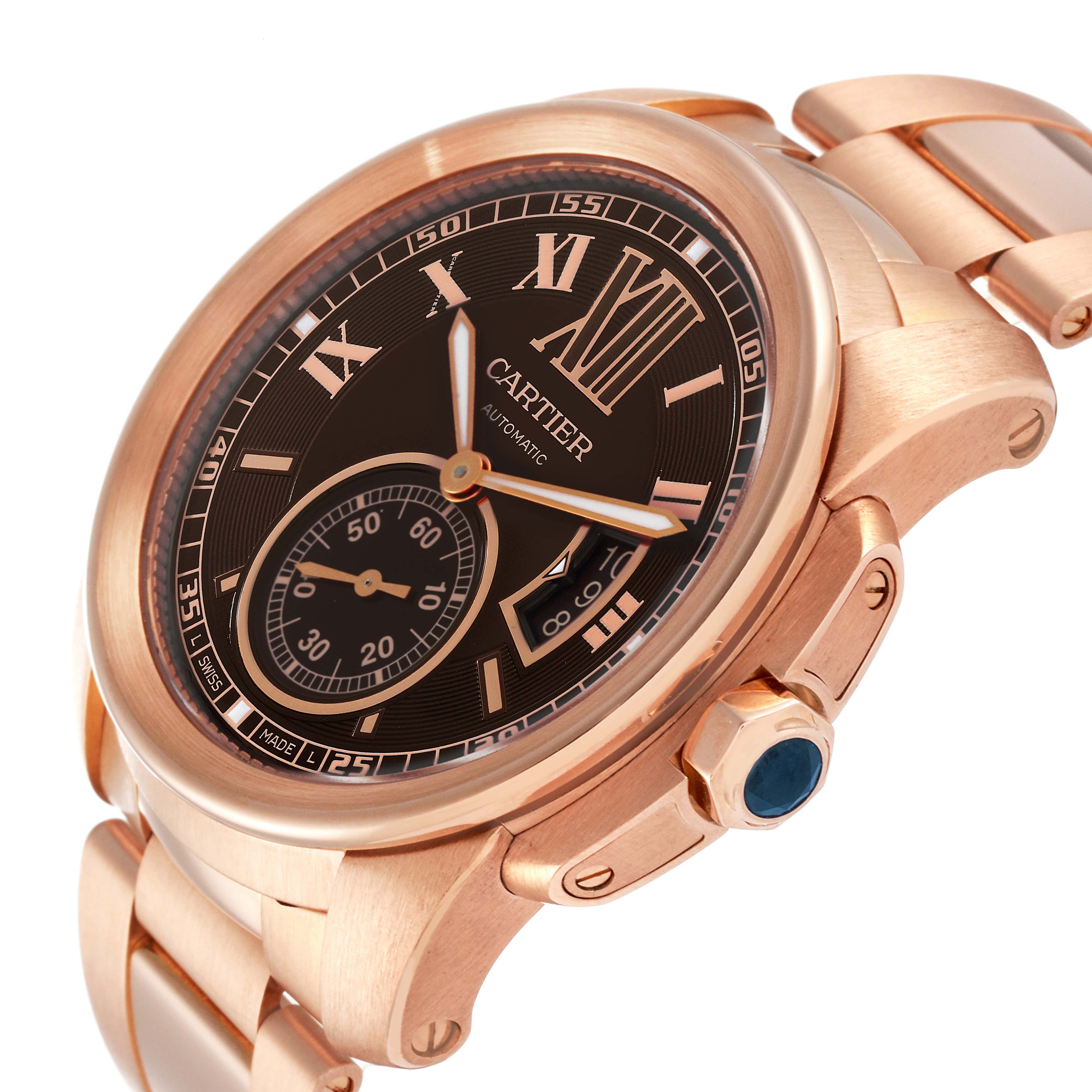 This image shows a close-up view of the Calibre de Cartier watch by Cartier, focusing on the face and bezel at an oblique angle.