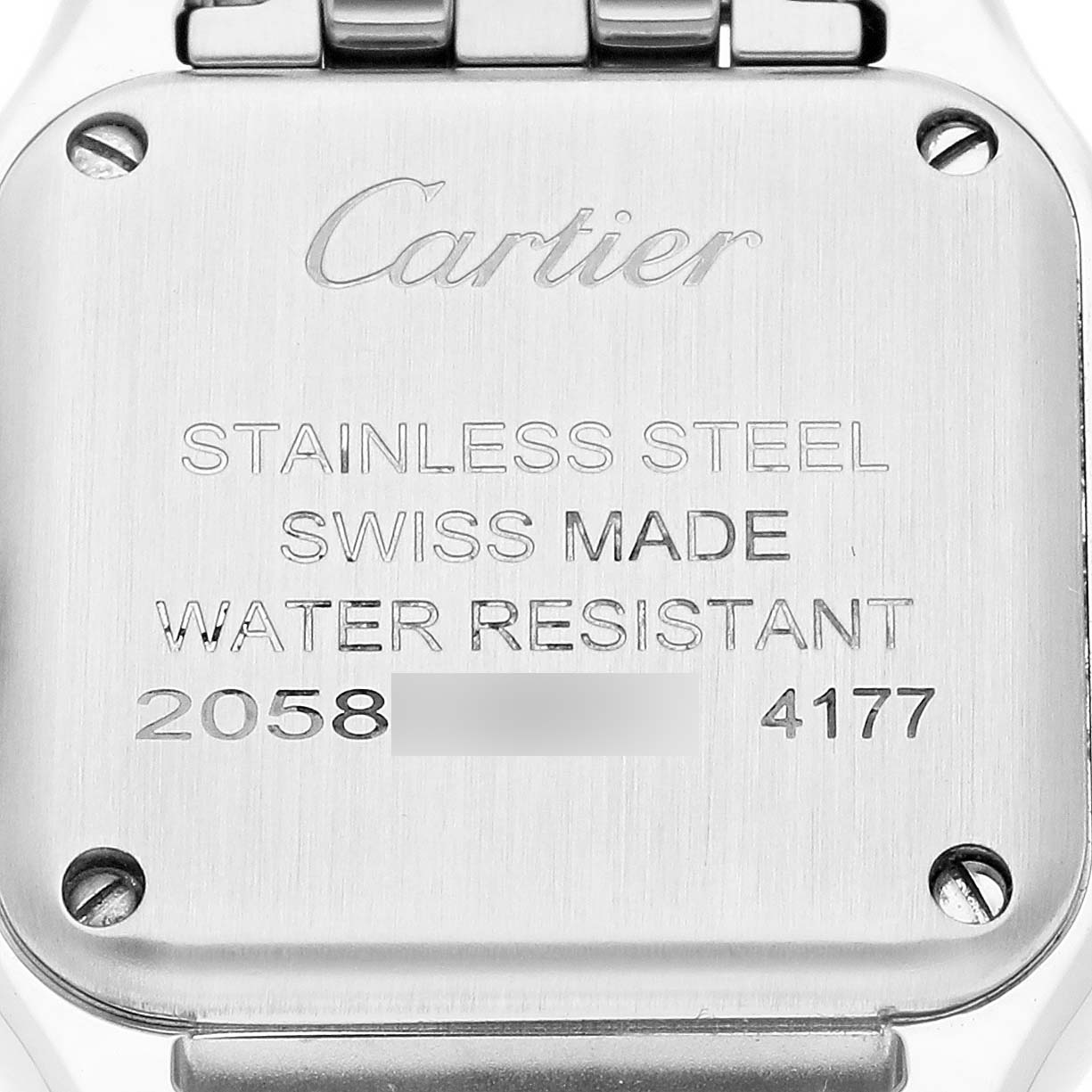 The image shows the case back of the Cartier Panthère watch, highlighting its engraving and screws.