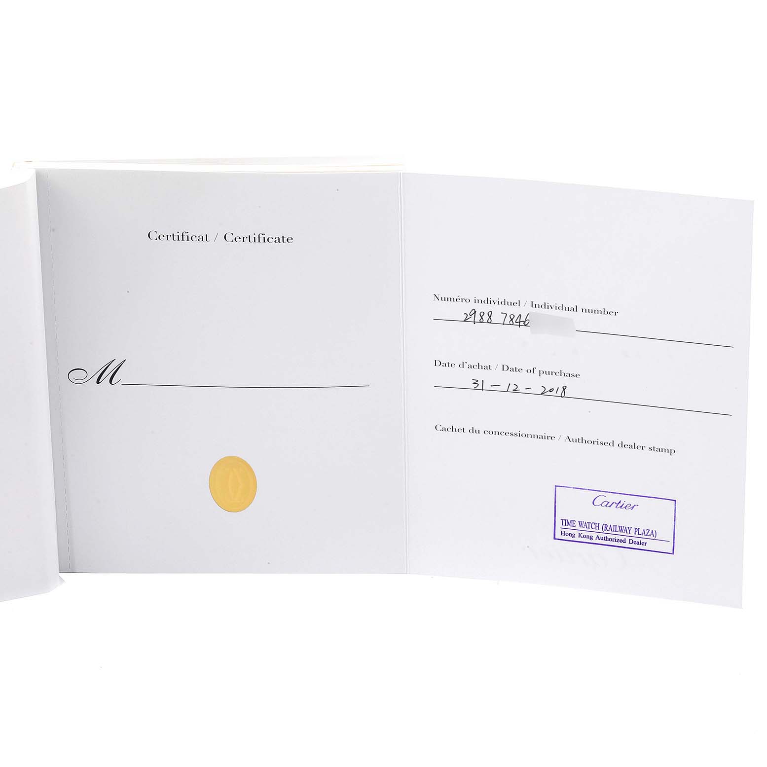 The image shows an open warranty certificate for a Cartier Ronde W6700455 Men
s Yellow Gold Silver Dial W6700455 Men
s Yellow Gold Silver Dial watch, including the date of purchase and dealer stamp.