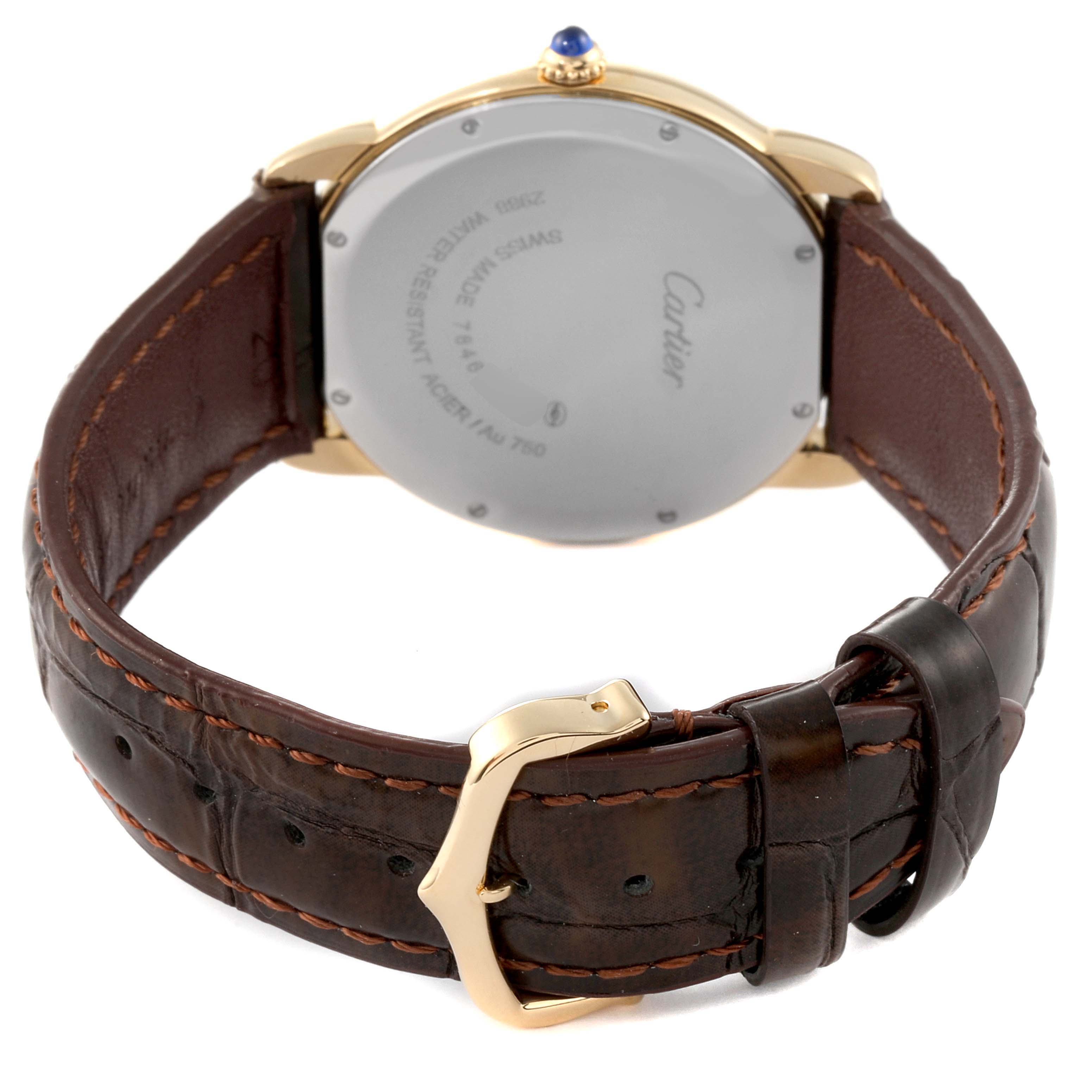 The image shows the back case, strap, and buckle of a Cartier Ronde W6700455 Men
s Yellow Gold Silver Dial W6700455 Men
s Yellow Gold Silver Dial watch, angled to highlight its leather band and case back details.