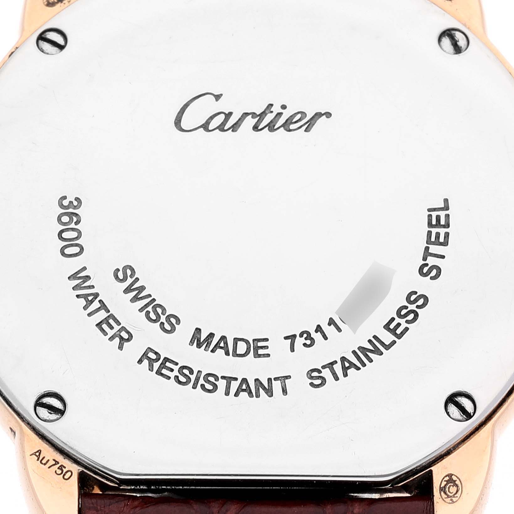 This image shows the back of a Cartier Ronde W6701007 Women's Rose Gold Silver Dial W6701007 Women's Rose Gold Silver Dial watch, highlighting its water resistance and Swiss-made engraving.