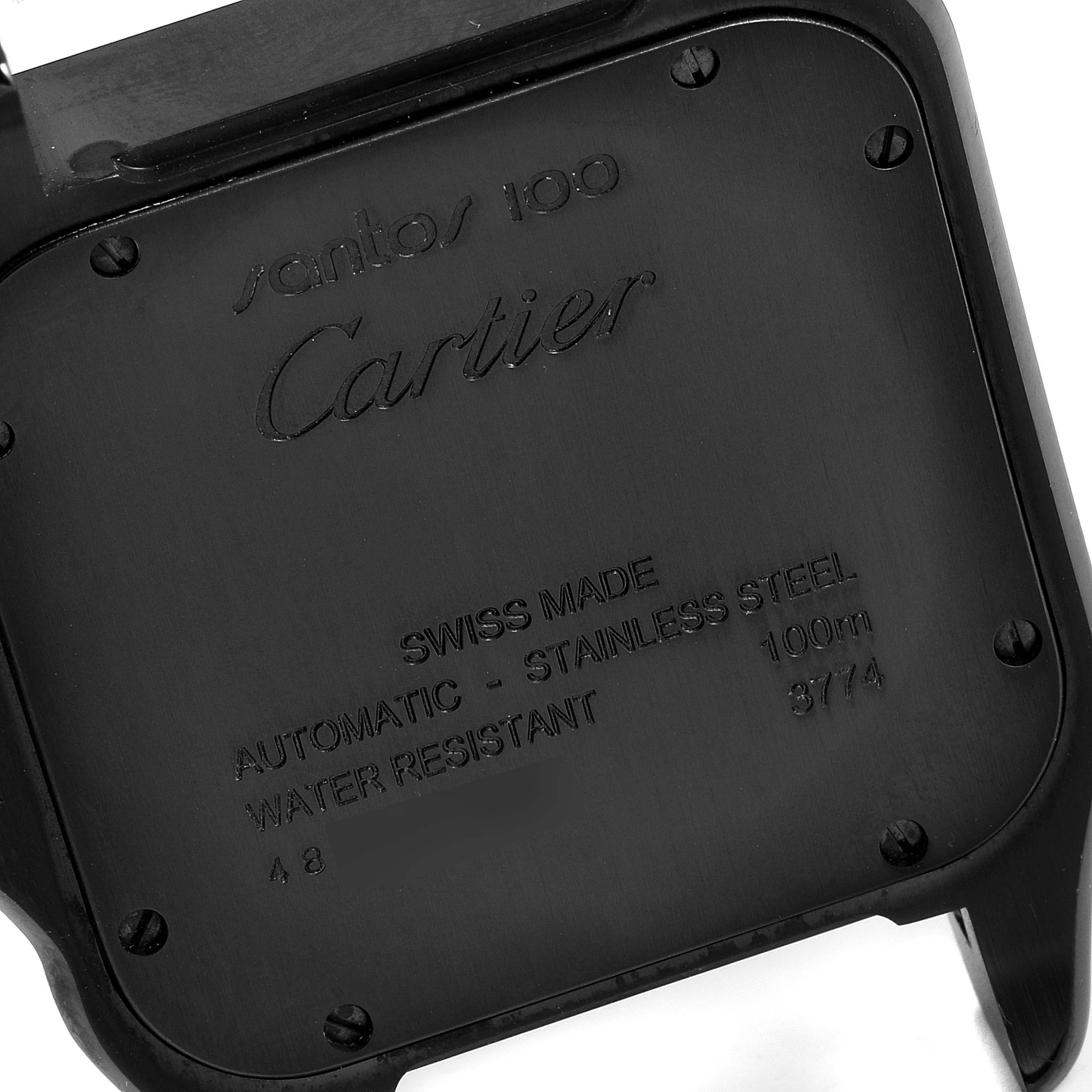 The image shows the back case of a Santos 100 watch by Cartier, highlighting its engravings.