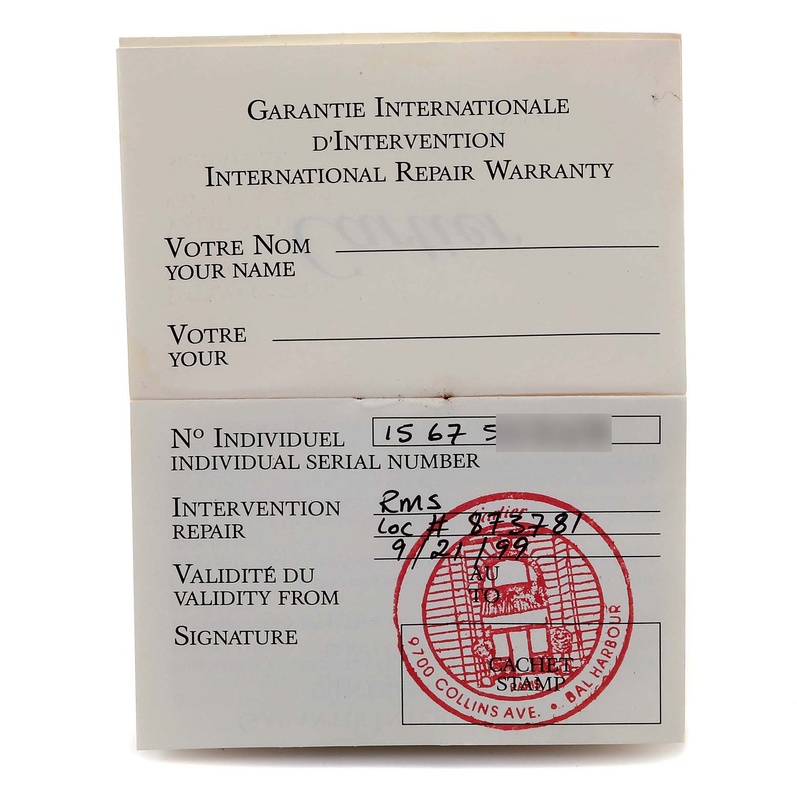This image shows the international repair warranty card for a Cartier Santos W20012C4 Women's Steel and Gold (two tone) Silver Dial W20012C4 Women's Steel and Gold (two tone) Silver Dial watch.