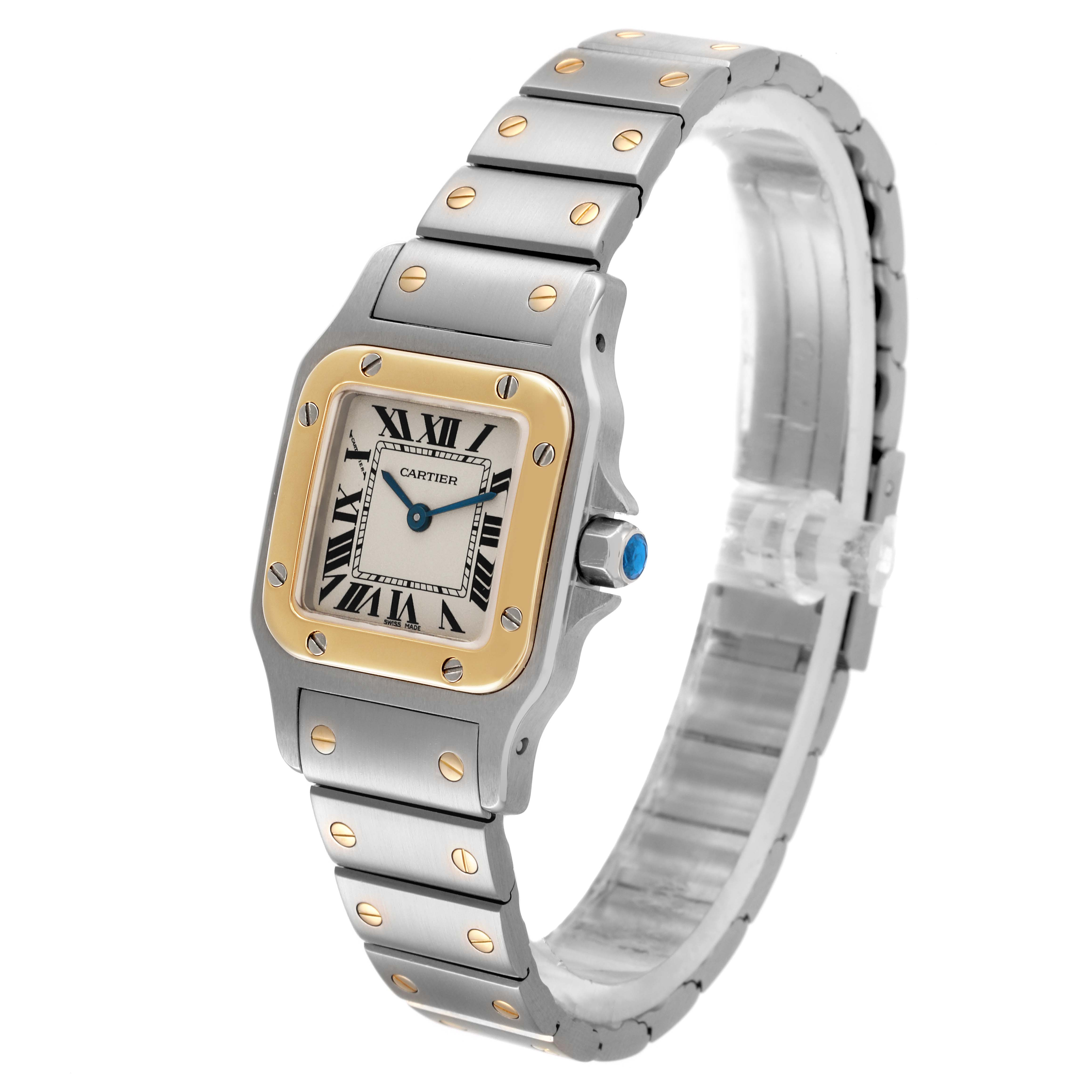 The Cartier Santos W20012C4 Women's Steel and Gold (two tone) Silver Dial W20012C4 Women's Steel and Gold (two tone) Silver Dial watch is shown from a three-quarter angle highlighting the face, bezel, bracelet, and crown.