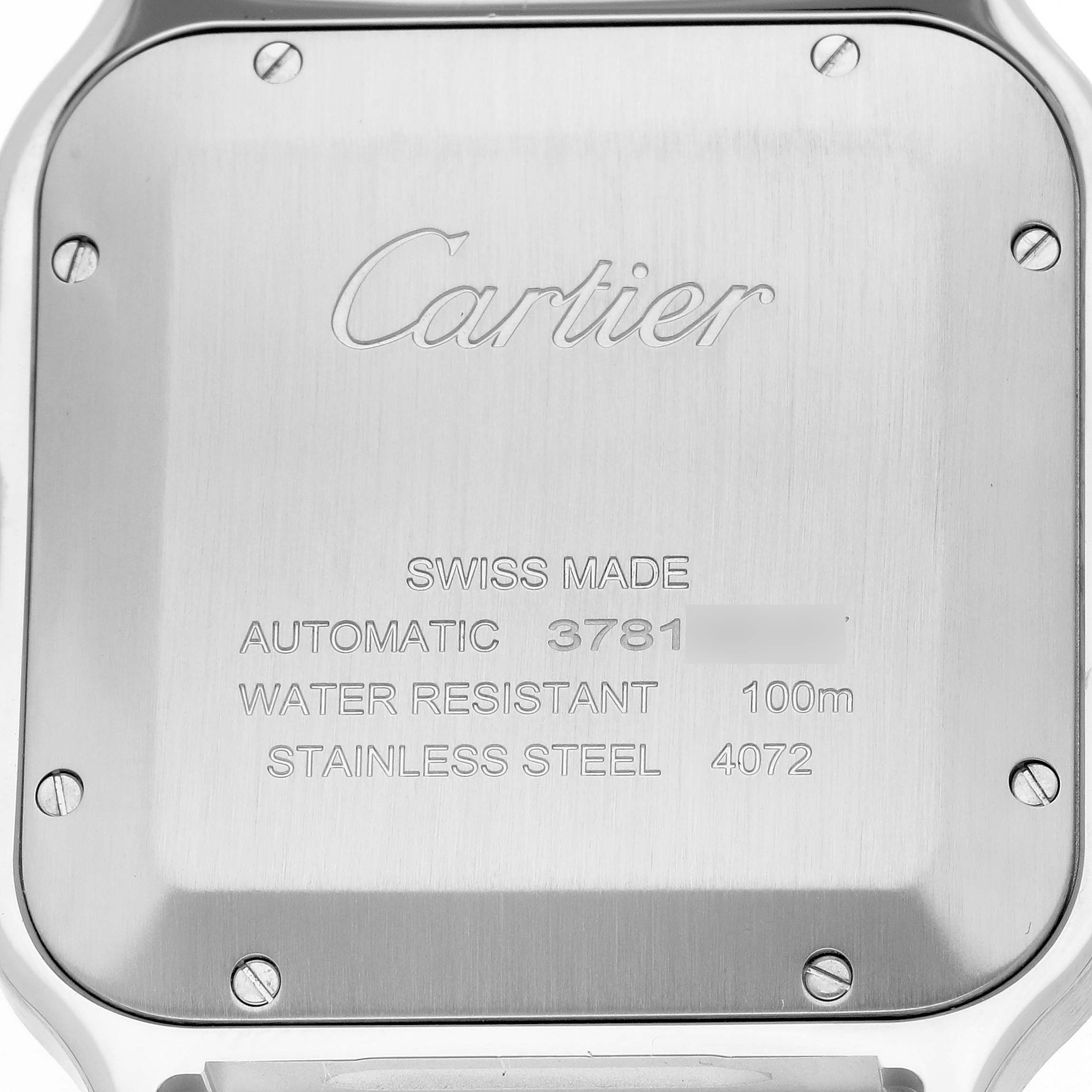 The image shows the back casing of a Cartier Santos WSSA0062 Men's Stainless Steel Green Dial WSSA0062 Men's Stainless Steel Green Dial watch, highlighting the branding and specifications.