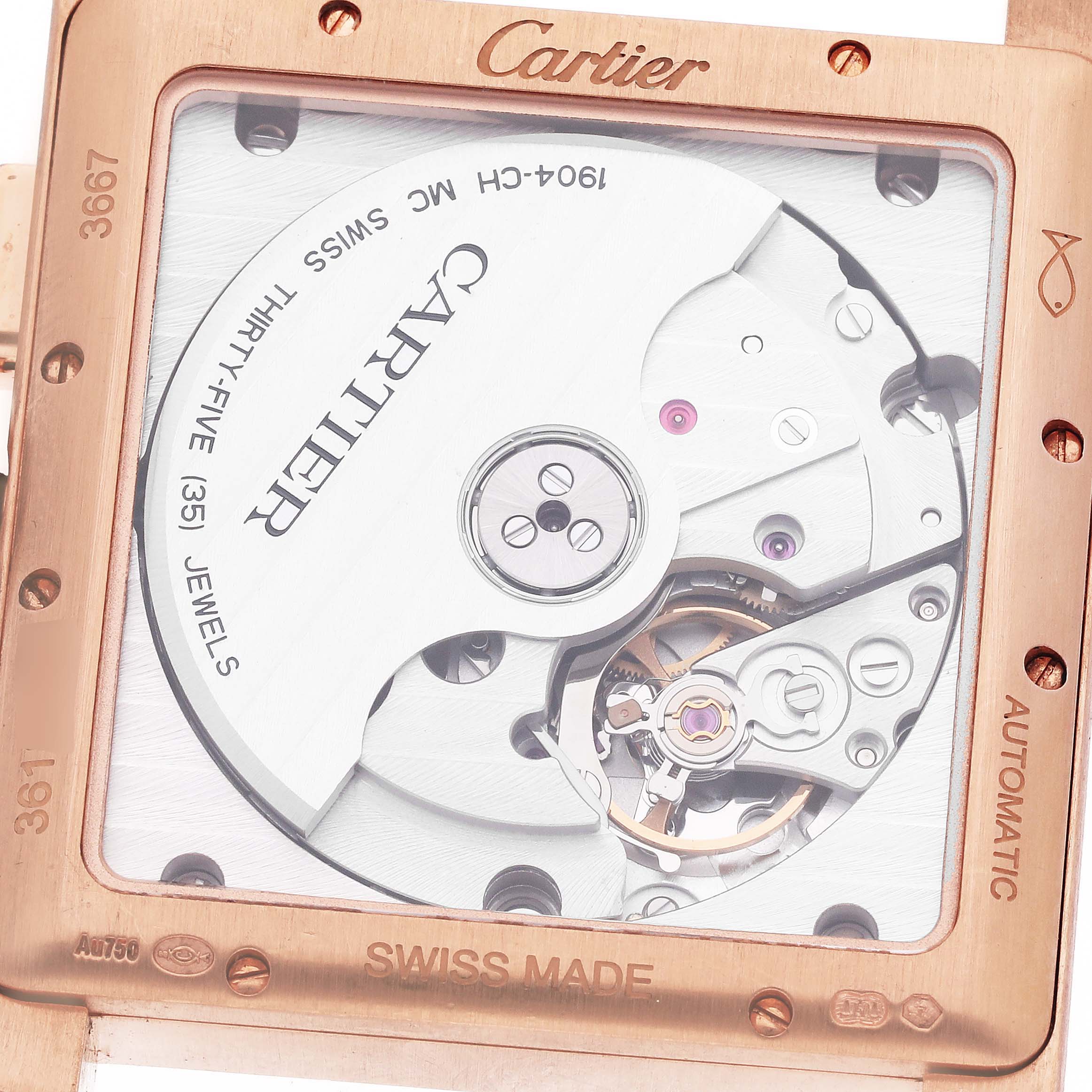 The image shows the back view of the Cartier Tank MC W5330005 Men's Rose Gold Silver Dial W5330005 Men's Rose Gold Silver Dial watch, highlighting its movement and internal mechanics.