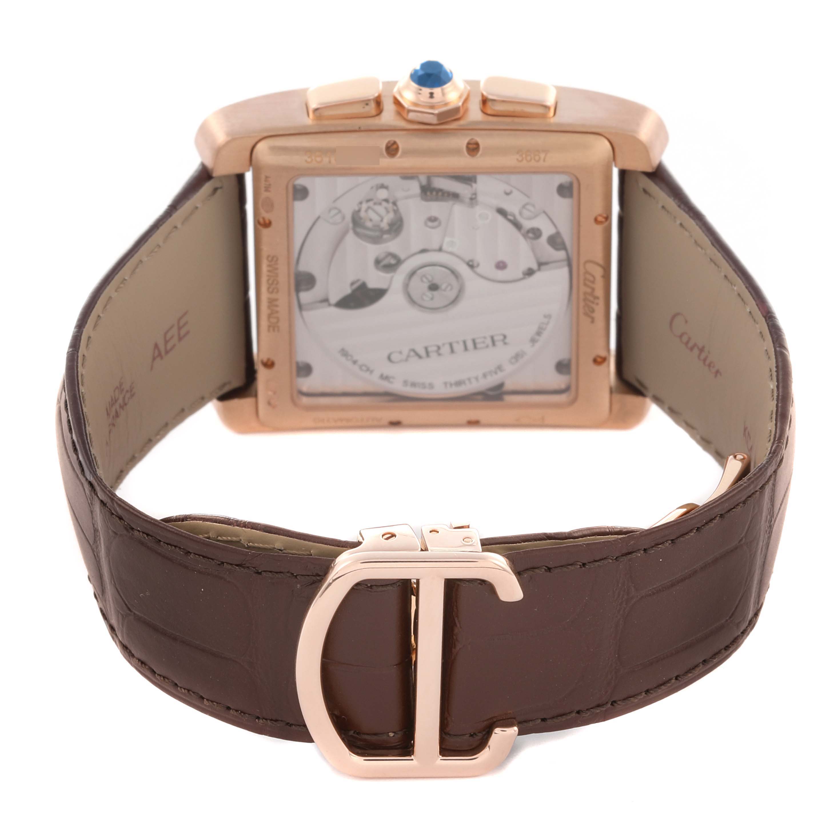 The Cartier Tank MC W5330005 Men's Rose Gold Silver Dial W5330005 Men's Rose Gold Silver Dial watch is shown from the back, displaying its movement and clasp on the brown leather strap.