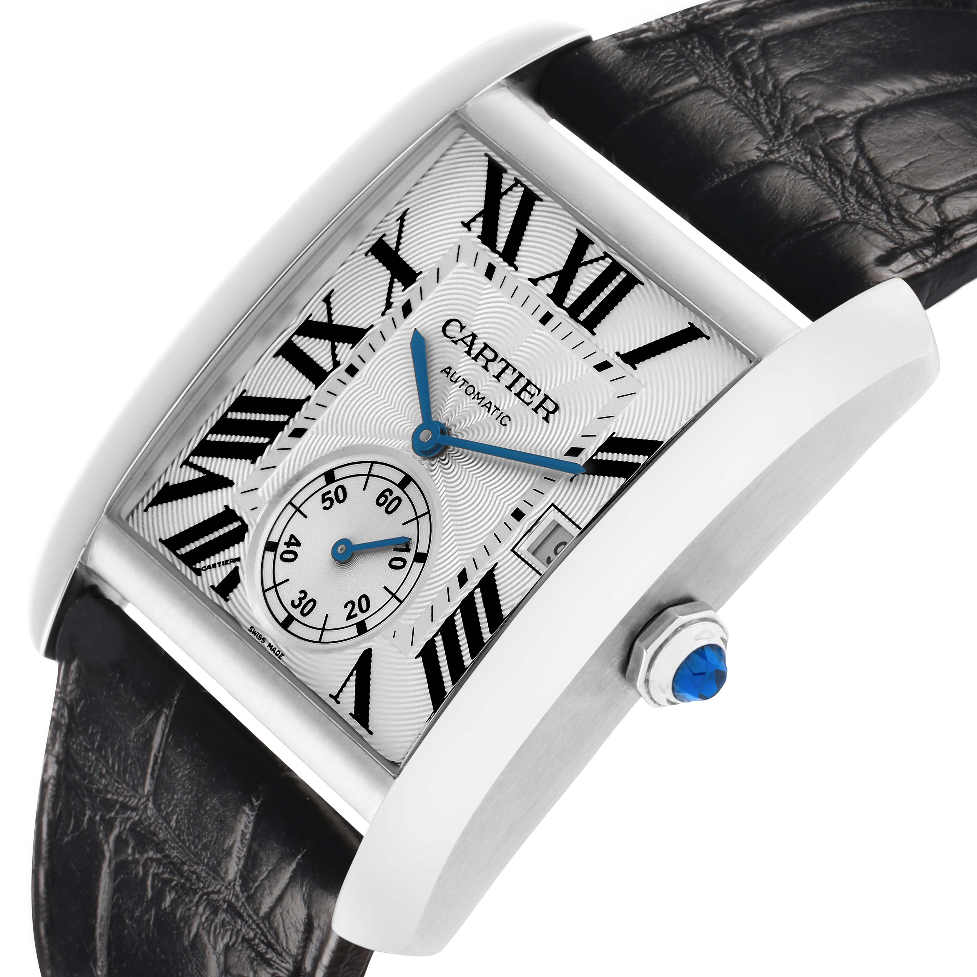 The Cartier Tank MC W5330003 Men
s Stainless Steel Silver Dial watch is shown at an angled top view, highlighting the dial, crown with a blue gemstone, and straps.