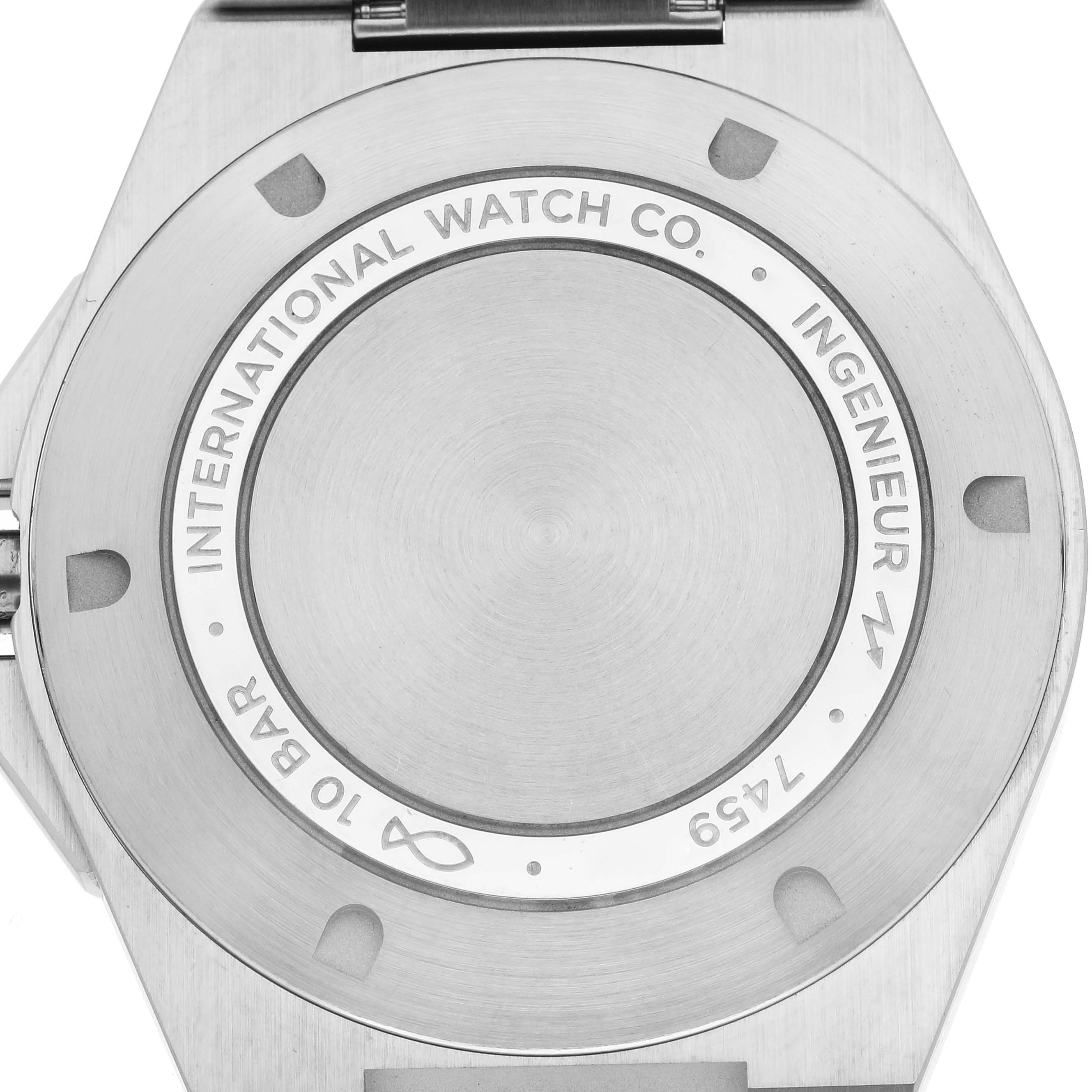 The image shows the back of the IWC Ingenieur IW328901 Men's Stainless Steel Black Dial IW328901 Men's Stainless Steel Black Dial watch, highlighting the engraved details and casing.