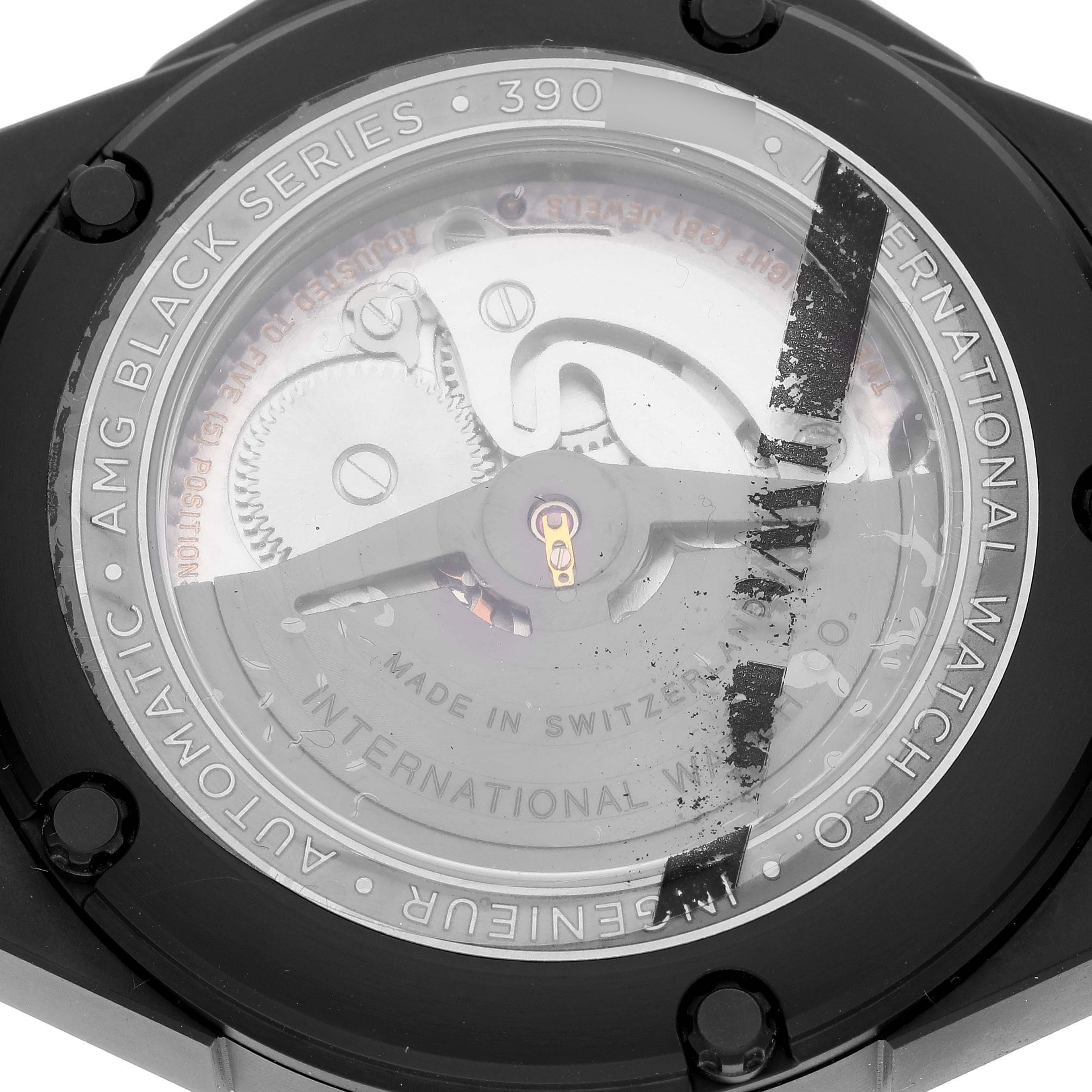 The image shows the back of the IWC Ingenieur IW322504 Men's Ceramic Brown Dial IW322504 Men's Ceramic Brown Dial watch, highlighting the automatic movement and "AMG Black Series" details.