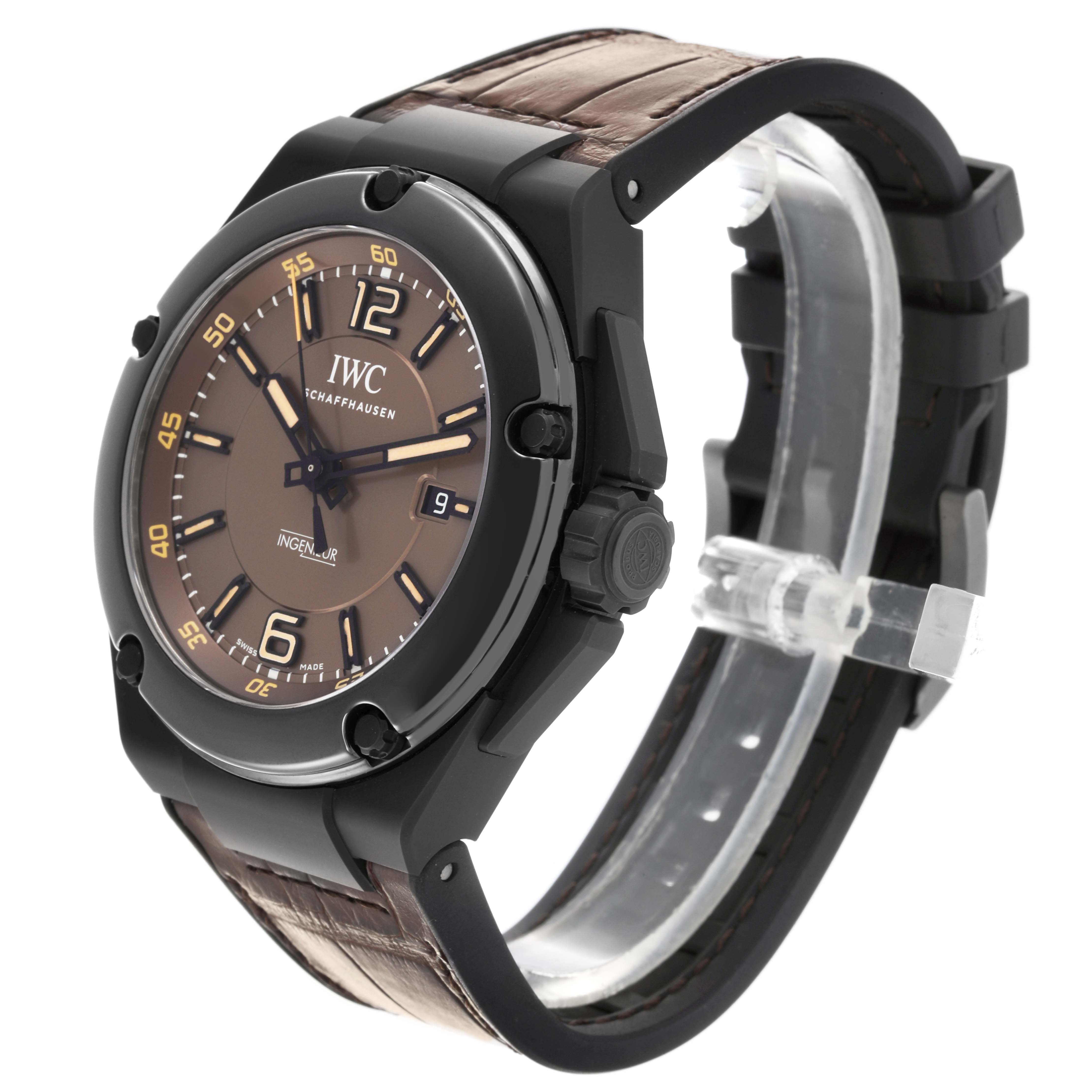 The IWC Ingenieur IW322504 Men's Ceramic Brown Dial IW322504 Men's Ceramic Brown Dial watch is shown at a slight angle, highlighting the dial, bezel, and leather strap.