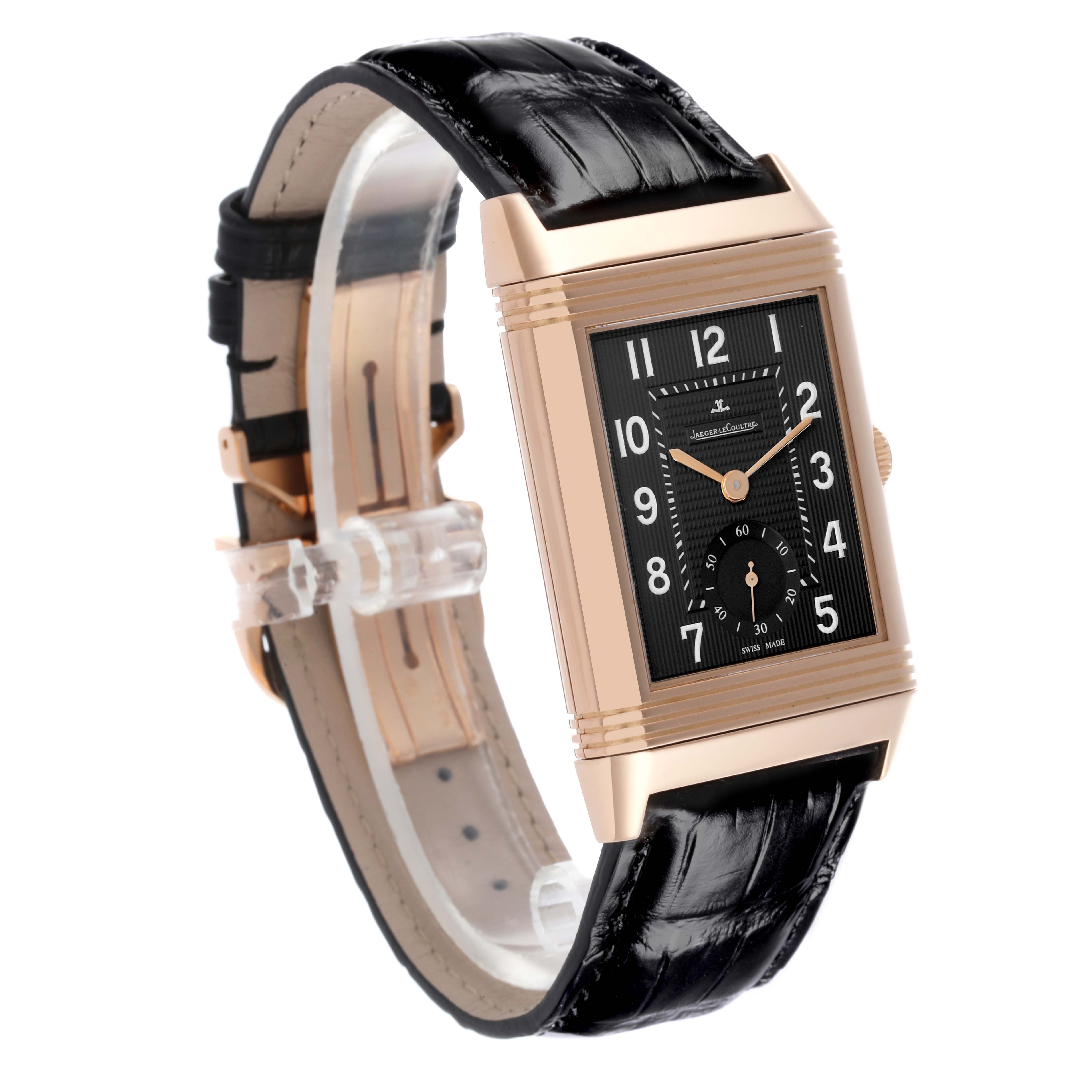 The Jaeger LeCoultre Reverso Q3732470 Men's Yellow Gold Black Dial Q3732470 Men's Yellow Gold Black Dial watch is shown at a slight angle, highlighting the dial, case, and leather strap.
