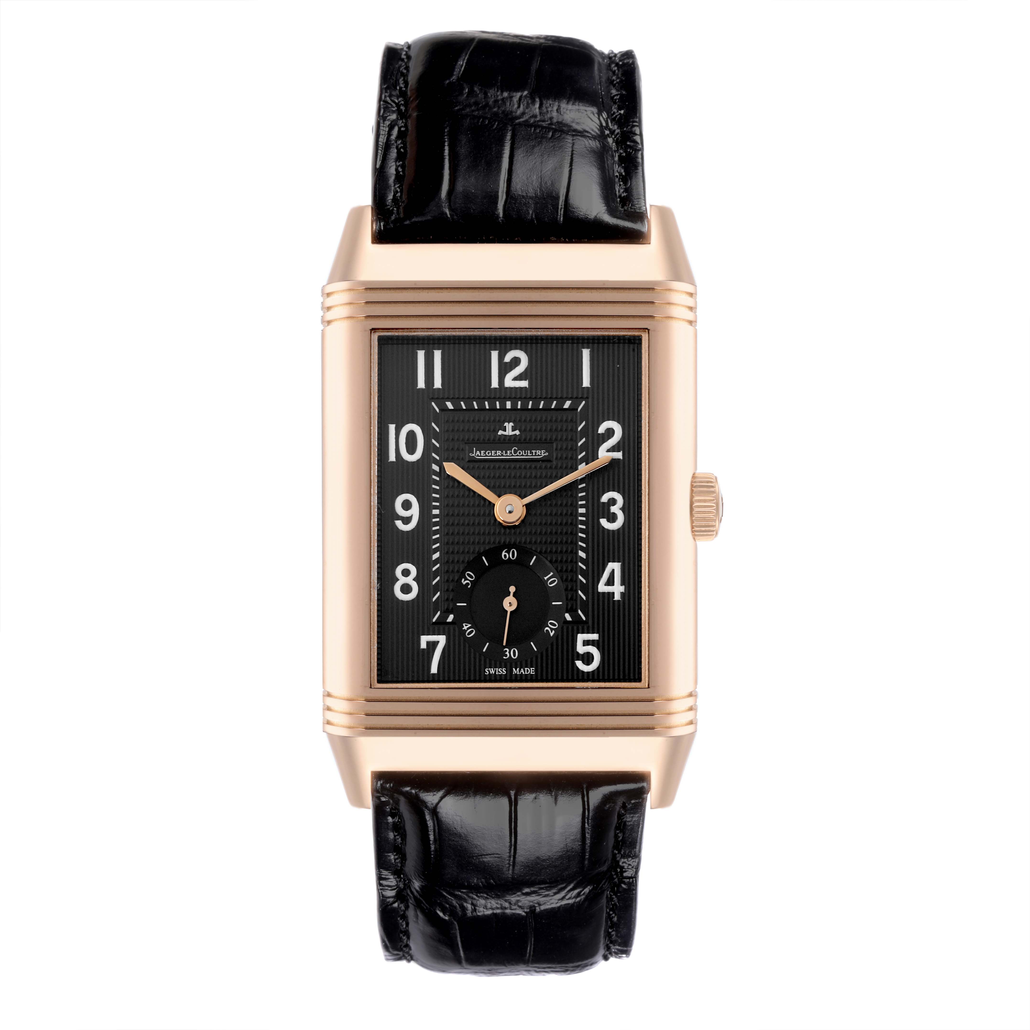 The Jaeger LeCoultre Reverso Q3732470 Men's Yellow Gold Black Dial Q3732470 Men's Yellow Gold Black Dial watch is shown from the front, displaying the face, numerals, hands, and leather strap.