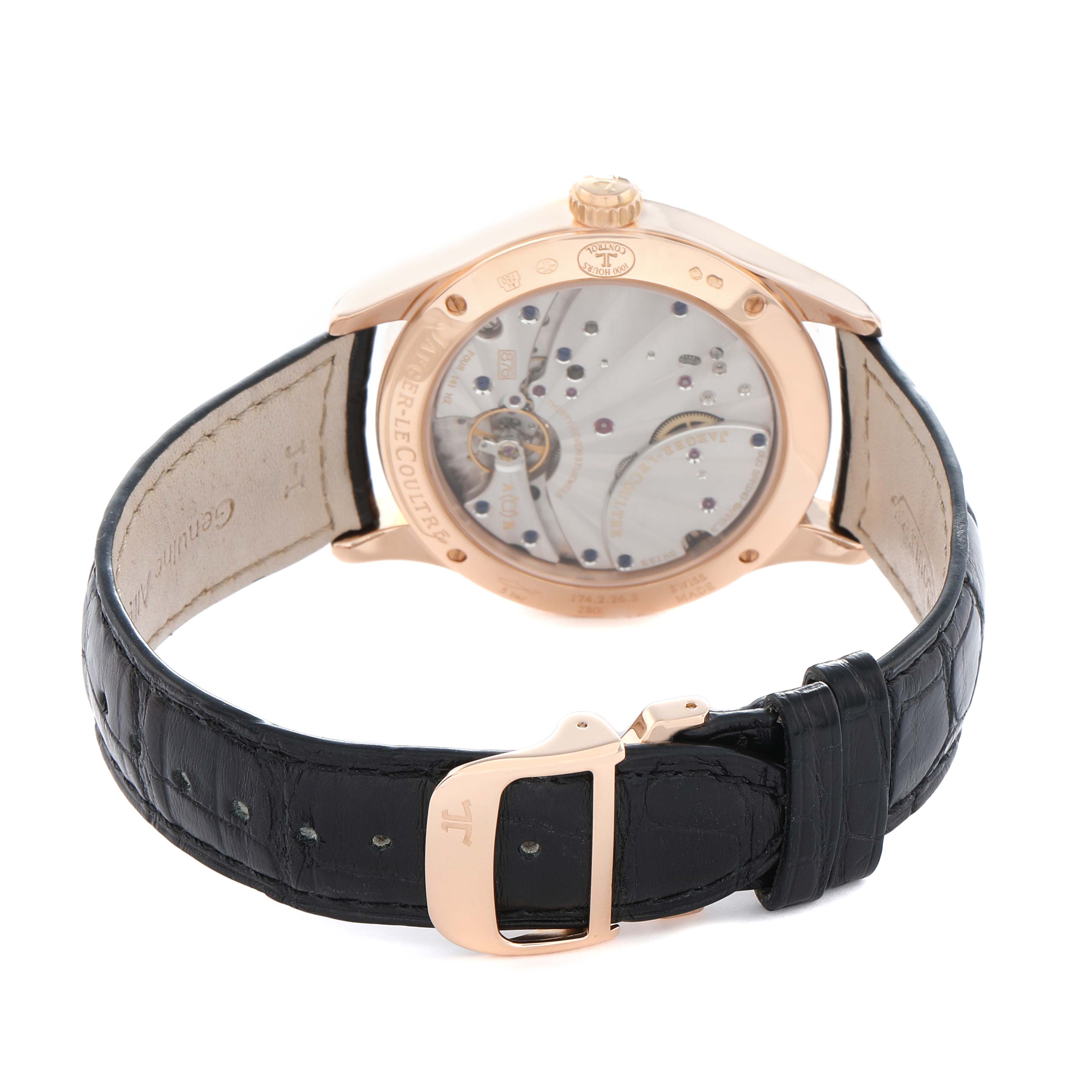 The Jaeger LeCoultre Master Q1612520 Men's Rose Gold Silver Dial watch is shown from the back, displaying its open case back and black leather strap with a clasp.