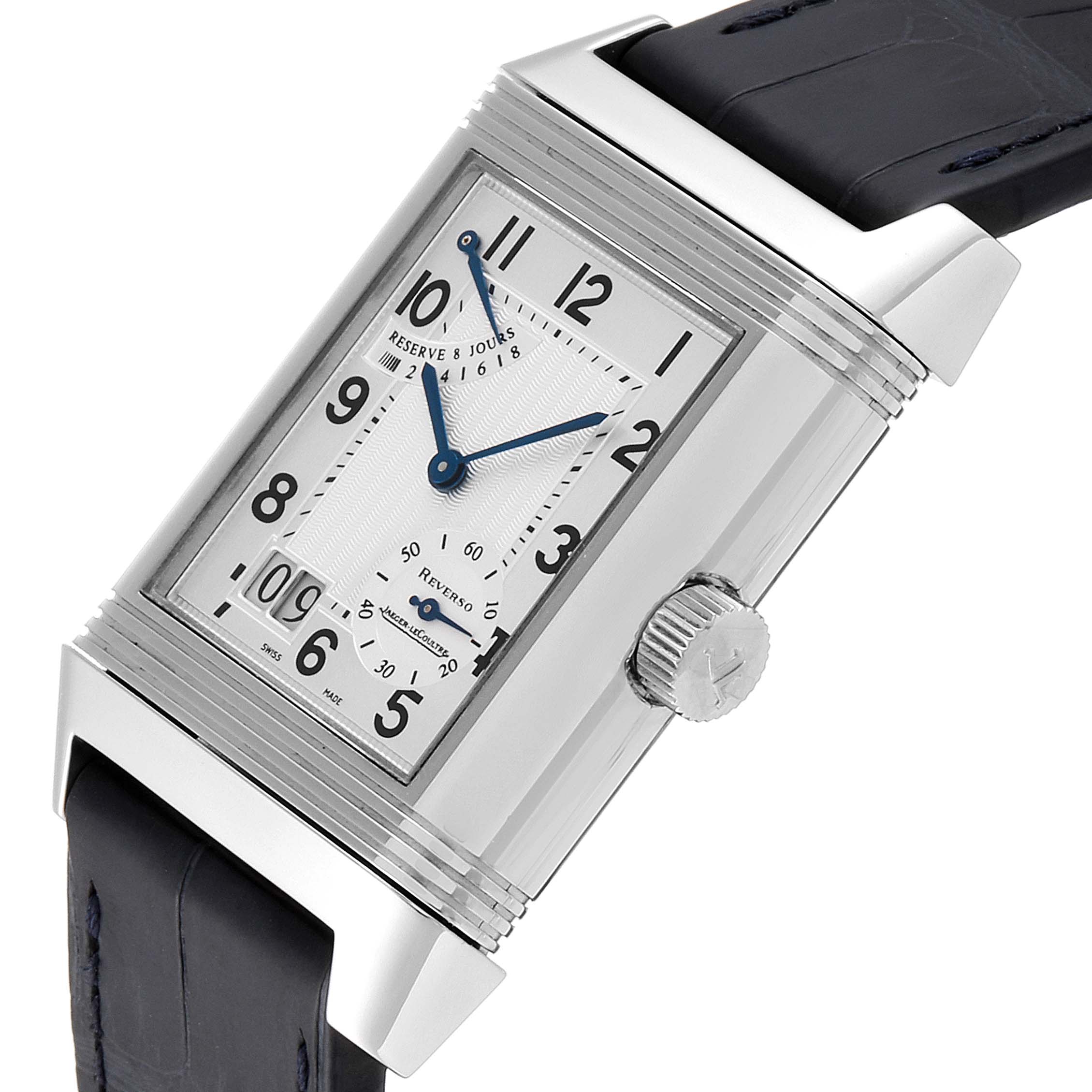 The image shows a Jaeger-LeCoultre Reverso watch at a slight angle, featuring the dial, crown, and part of the leather strap.