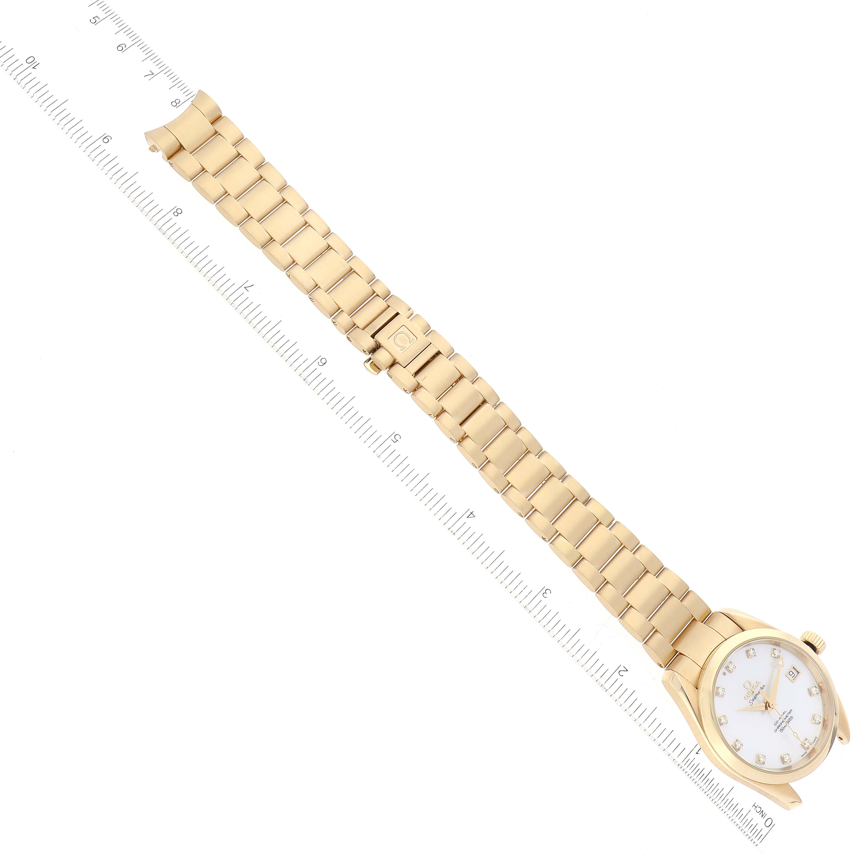 The image shows the entire Omega Aqua Terra 2104.75.00 Men's Yellow Gold Mother of Pearl Dial 2104.75.00 Men's Yellow Gold Mother of Pearl Dial watch, including the face, crown, and full bracelet, photographed from a top-down angle.