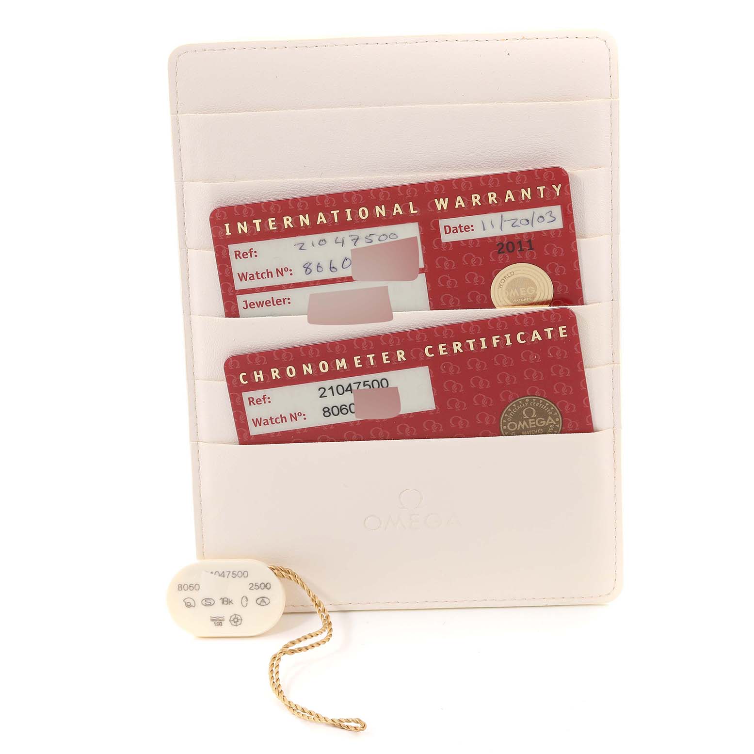 The image shows the International Warranty and Chronometer Certificate cards, along with a tag for the Omega Aqua Terra 2104.75.00 Men's Yellow Gold Mother of Pearl Dial 2104.75.00 Men's Yellow Gold Mother of Pearl Dial model.