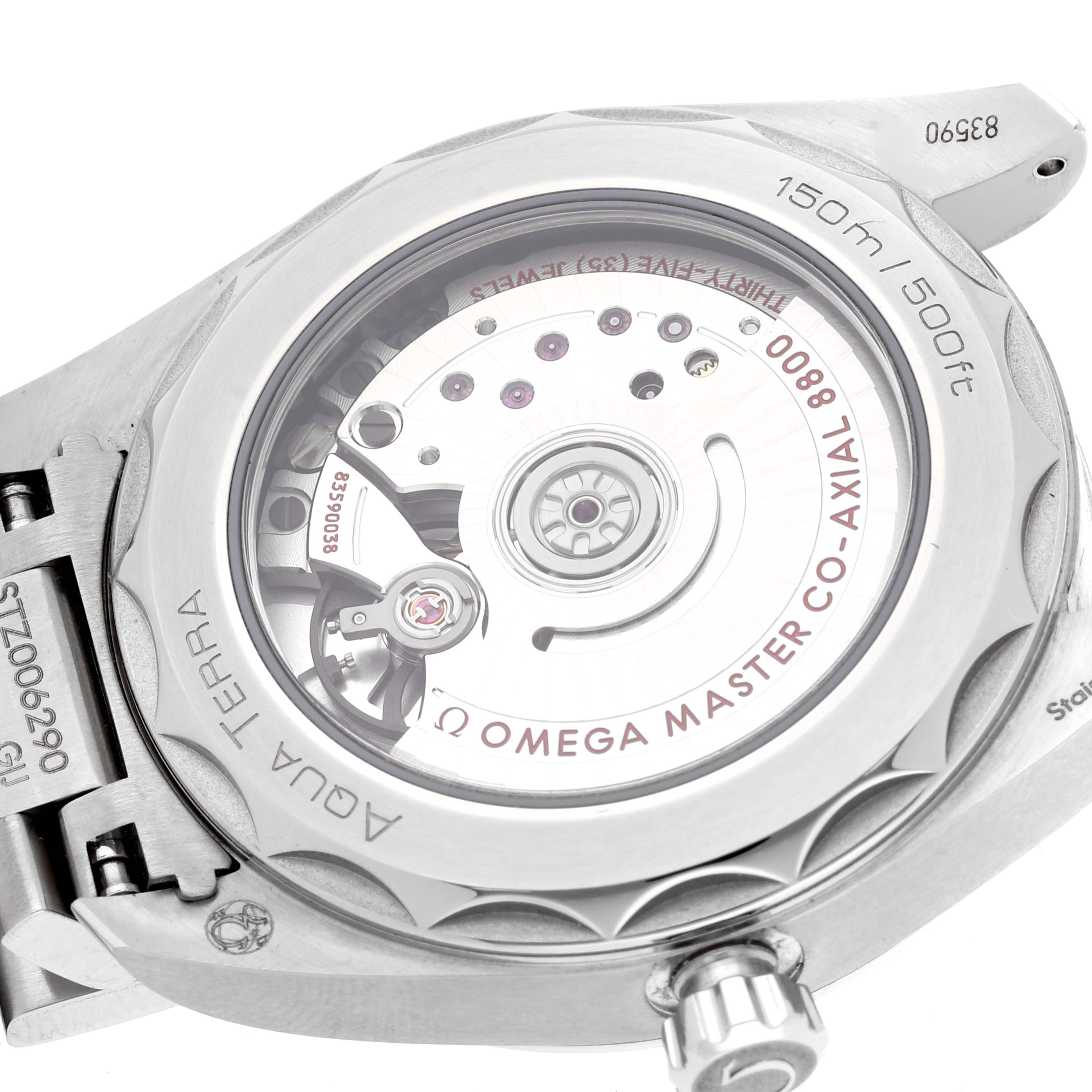 The image shows the back of an Omega Aqua Terra 220.10.38.20.03.001 Men
s Stainless Steel Blue Dial 220.10.38.20.03.001 Men
s Stainless Steel Blue Dial watch, highlighting its coaxial movement and water resistance.