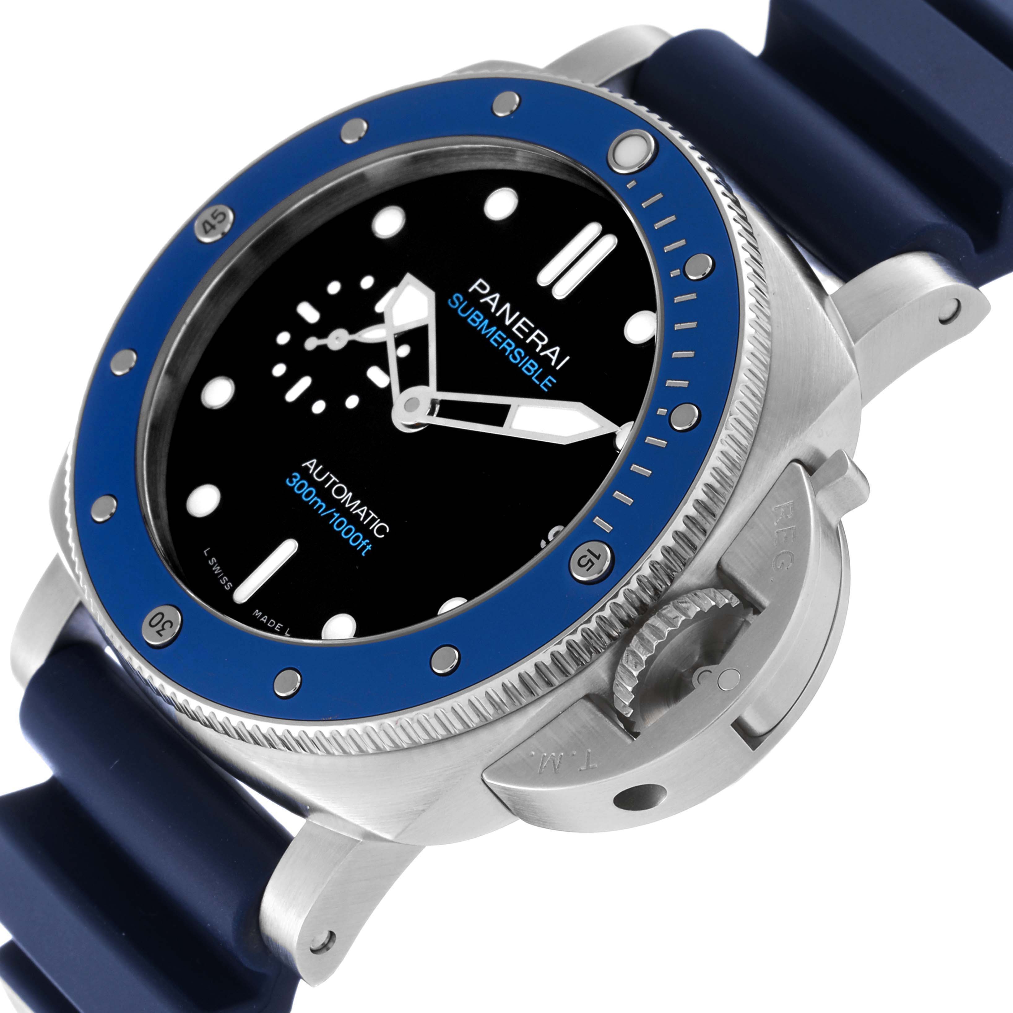 The Panerai Submersible PAM01209 Men
s Stainless Steel Black Dial PAM01209 Men
s Stainless Steel Black Dial watch is shown at an angle, highlighting its blue bezel, crown guard, and rubber strap.