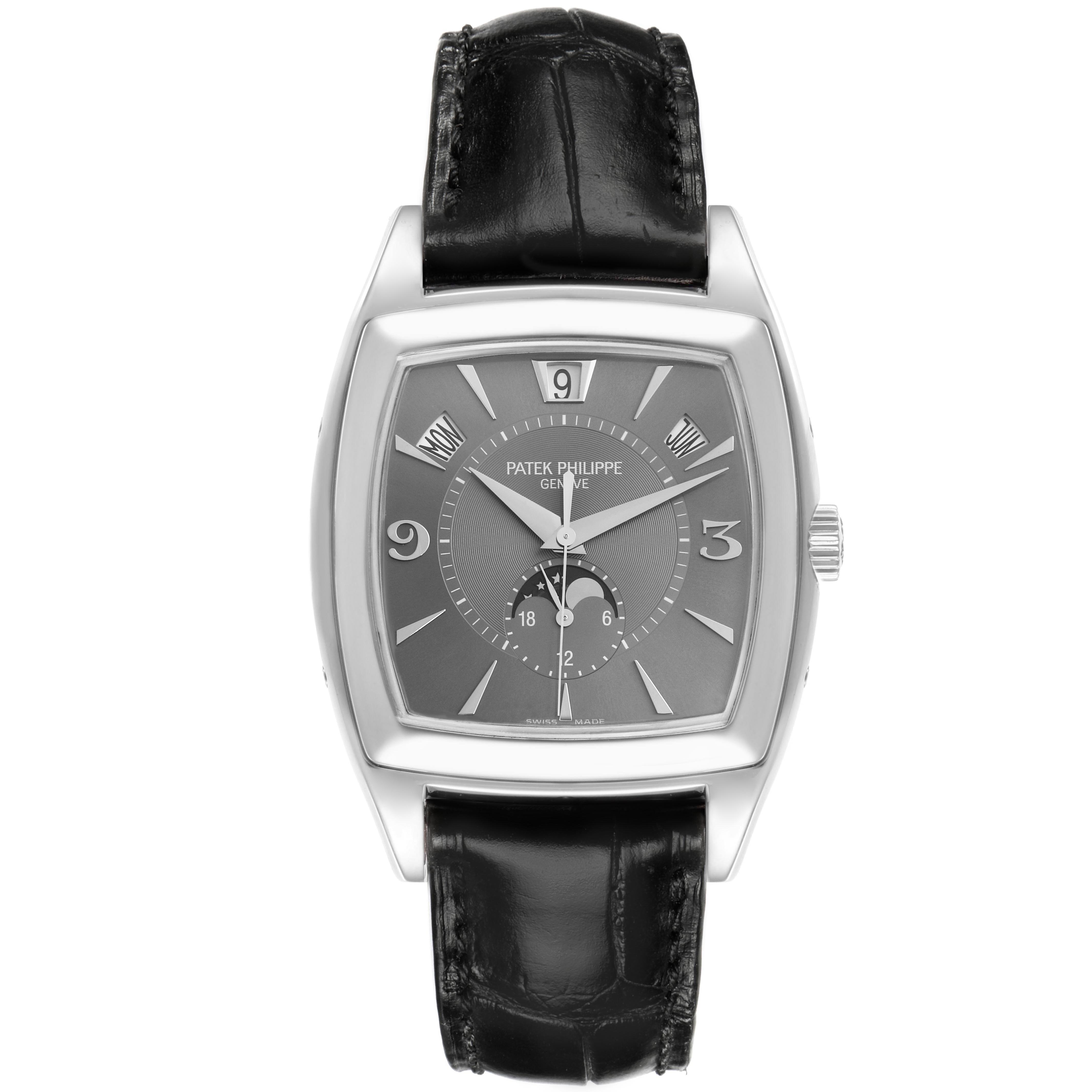The Patek Philippe Gondolo 5135G-010 Men
s White Gold Grey Dial watch is shown from a frontal angle, highlighting its dial, hands, and black leather strap.
