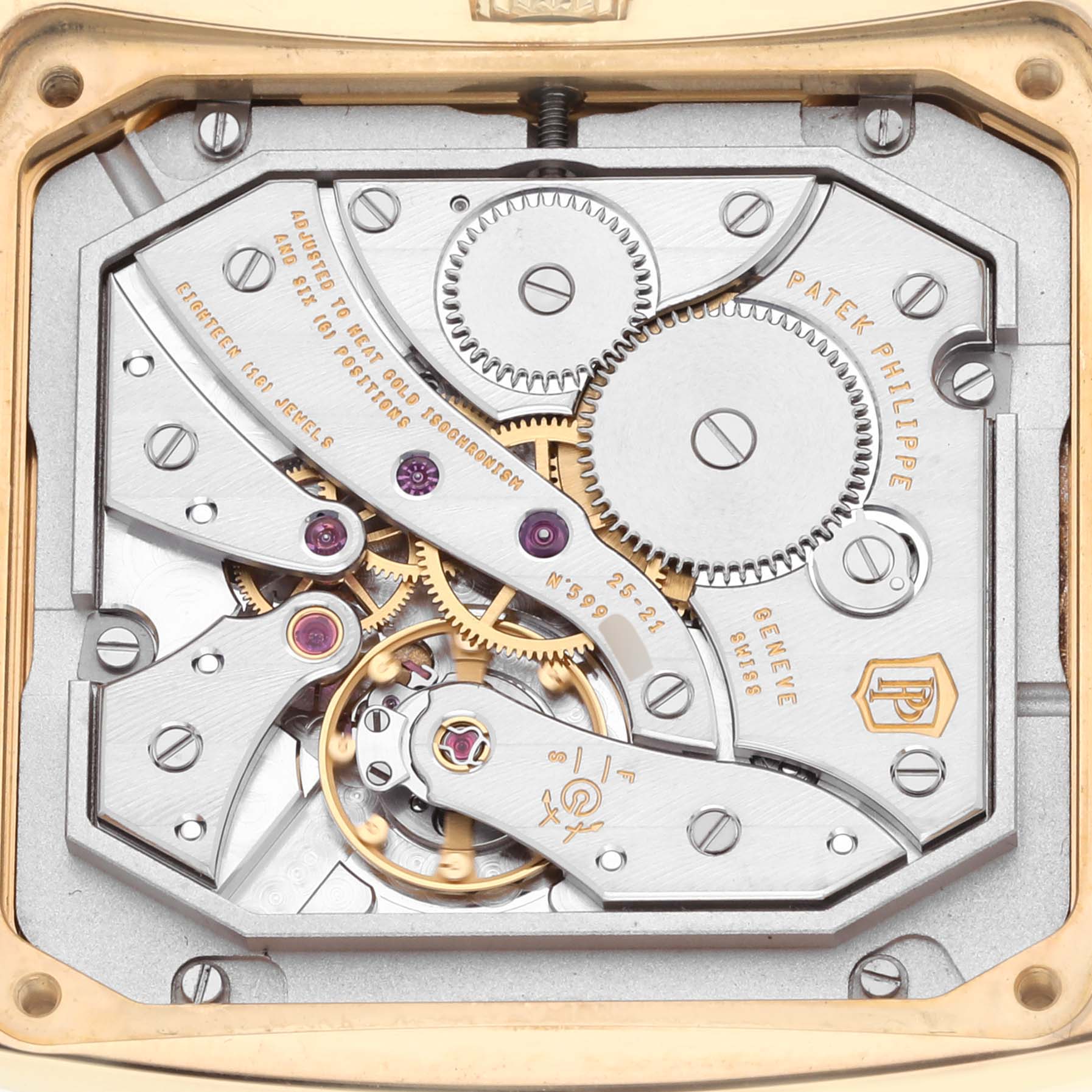 The image shows a close-up of the Patek Philippe Gondolo 5124J Men's Yellow Gold Silver Dial 5124J Men's Yellow Gold Silver Dial watch's intricate movement assembly from the back.