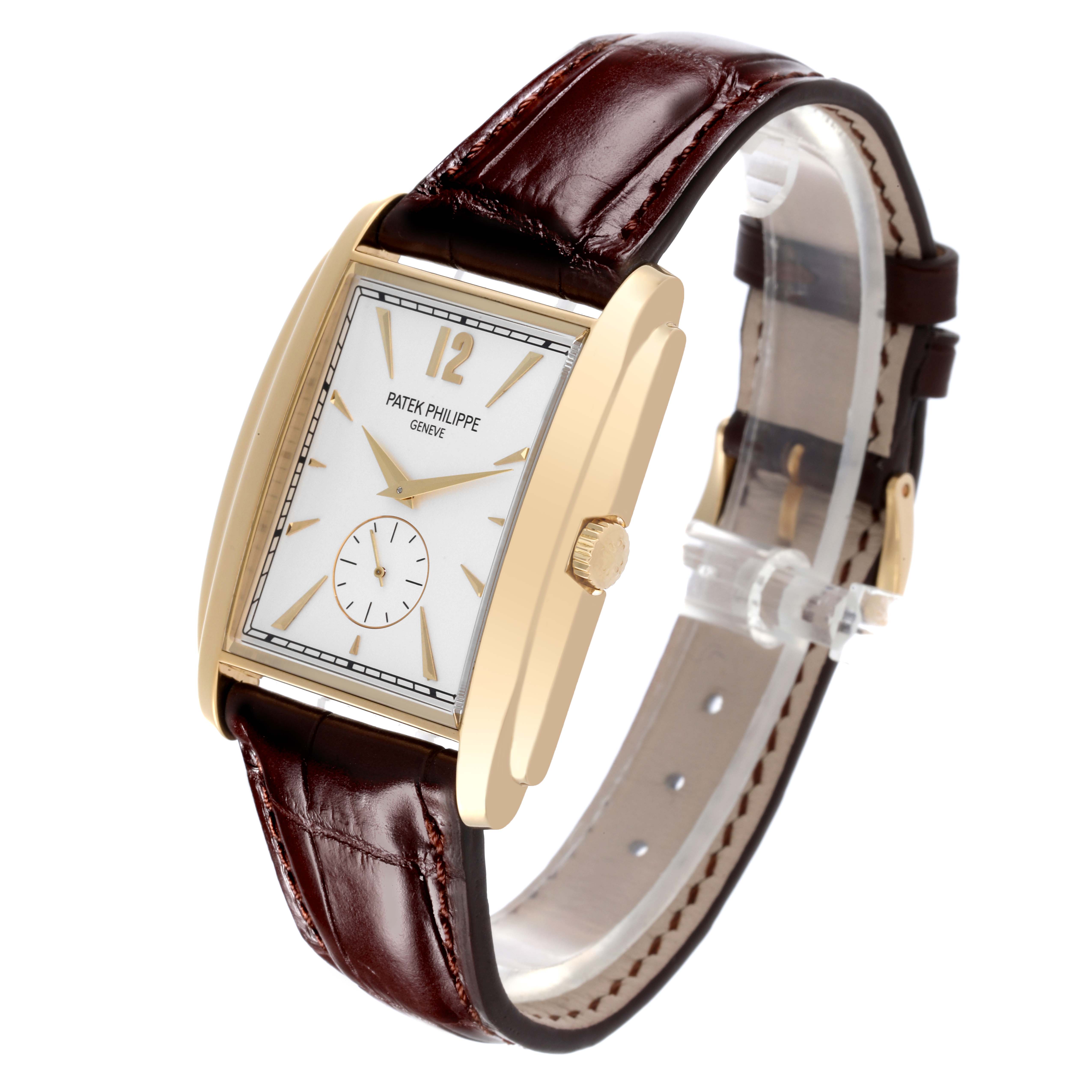 The Patek Philippe Gondolo 5124J Men's Yellow Gold Silver Dial 5124J Men's Yellow Gold Silver Dial watch is shown at a slight angle, displaying the front face, gold case, crown, and leather strap.