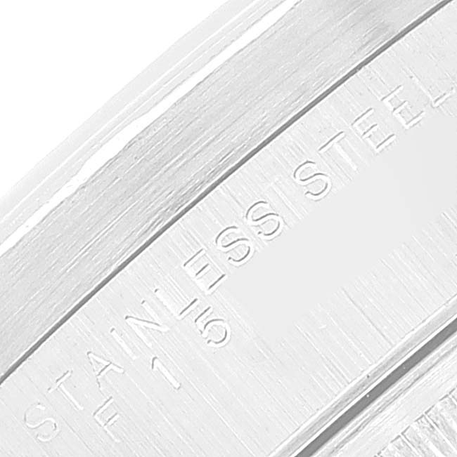 This close-up image shows the engraved text "STAINLESS STEEL" on the side of the case of the Rolex Air-King 14010 Men's Stainless Steel White Dial 14010 Men's Stainless Steel White Dial watch.