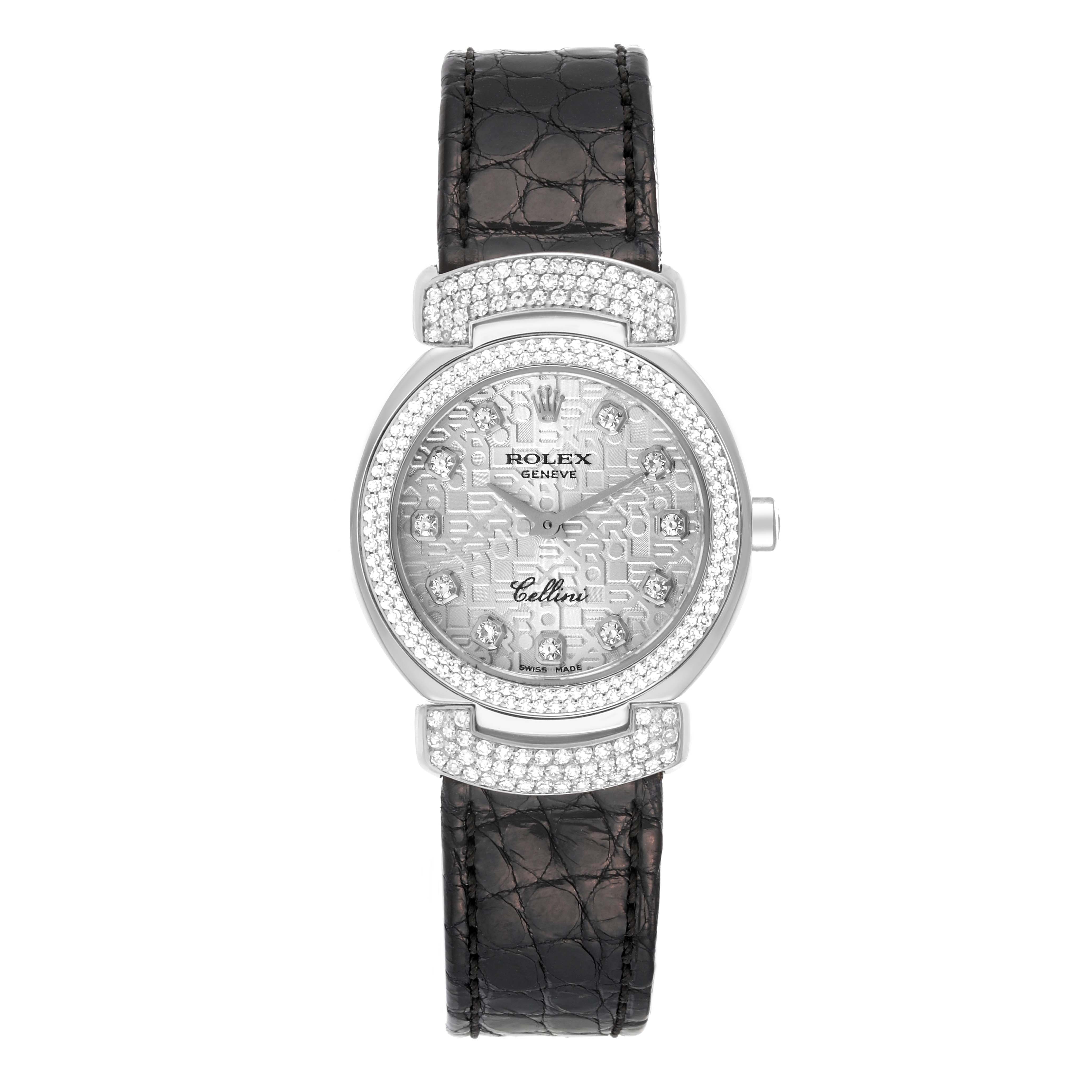 The image shows a front view of a Rolex Cellini 6673 Women's White Gold Silver Dial 6673 Women's White Gold Silver Dial watch, featuring a diamond-studded bezel and a black leather strap.