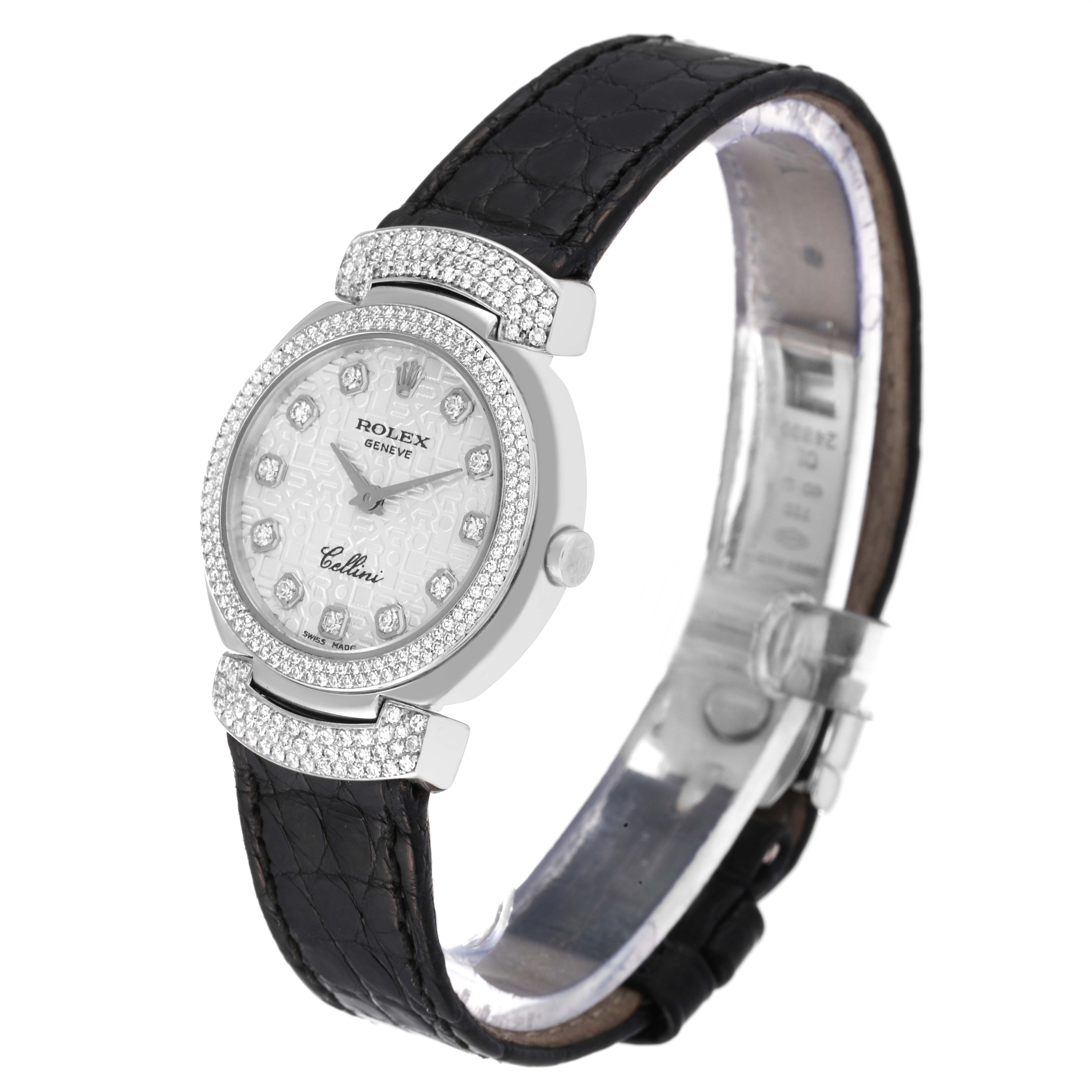 The Rolex Cellini 6673 Women's White Gold Silver Dial 6673 Women's White Gold Silver Dial watch is shown at an angled side view, highlighting its black leather strap, diamond bezel, and dial.