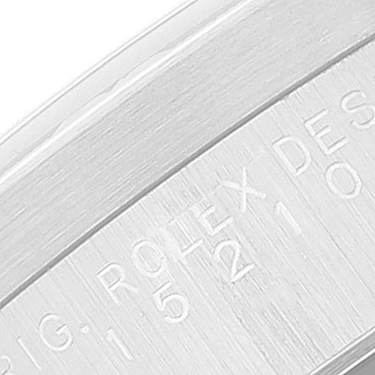 This close-up image shows the engraved inner bezel of a Rolex Date 15210 Men
s Stainless Steel Black Dial 15210 Men
s Stainless Steel Black Dial model watch.