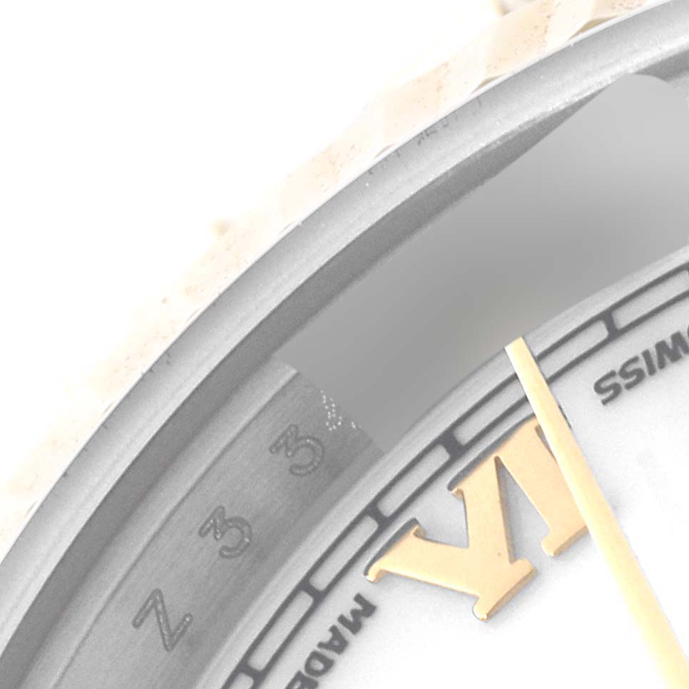 This image shows a close-up angle of the dial and bezel of a Rolex Datejust 179173 Women's Steel and Gold (two tone) White Dial 179173 Women's Steel and Gold (two tone) White Dial model watch.