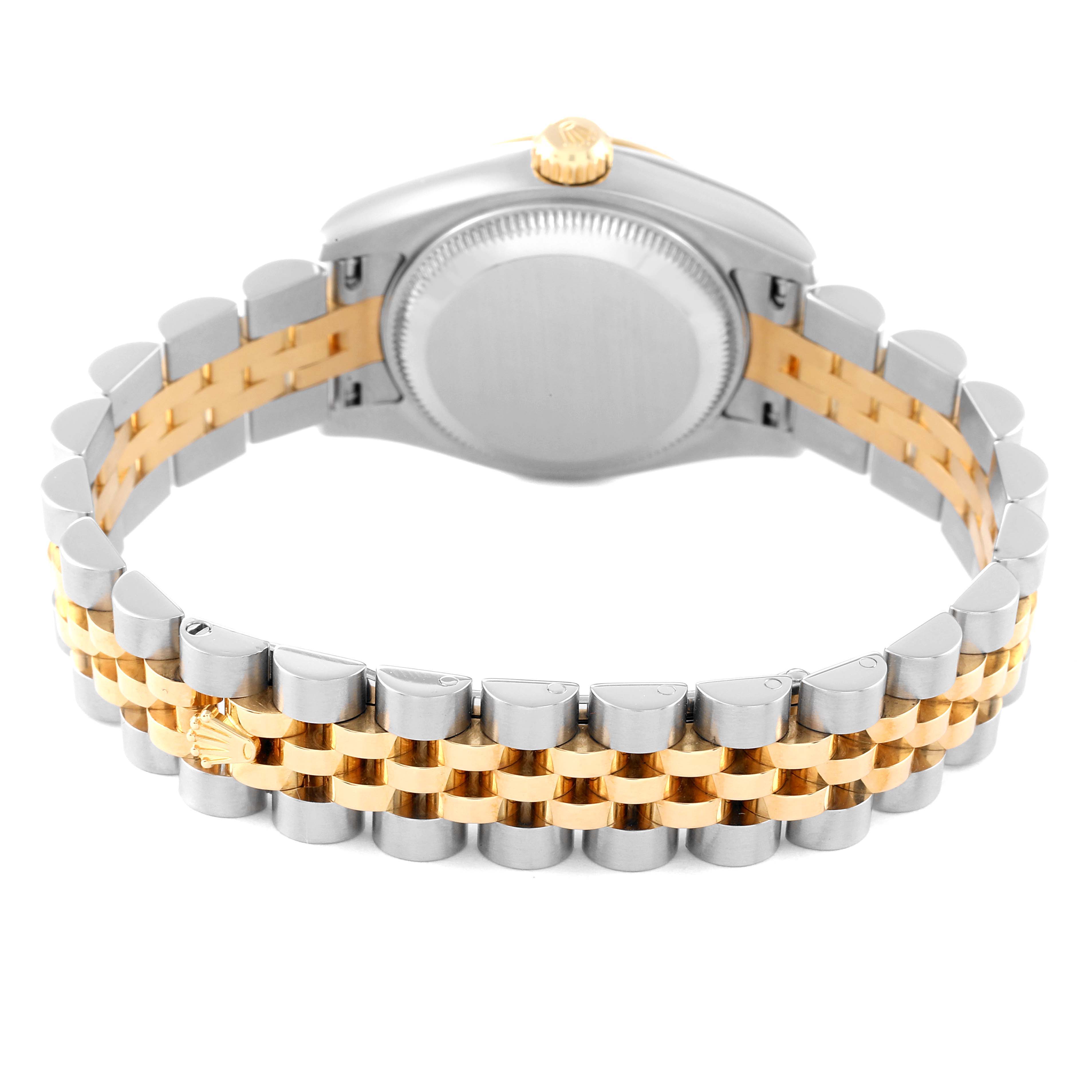 The image shows the back view of a Rolex Datejust 179173 Women's Steel and Gold (two tone) White Dial 179173 Women's Steel and Gold (two tone) White Dial watch, focusing on its two-tone metal bracelet and case back.
