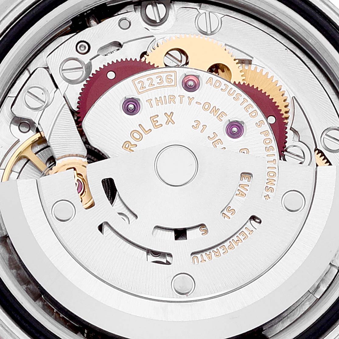 The image shows the internal mechanism of a Rolex Datejust 279171 Women's Steel and Gold (two tone) Blue Dial 279171 Women's Steel and Gold (two tone) Blue Dial model, including the gears and rotor.