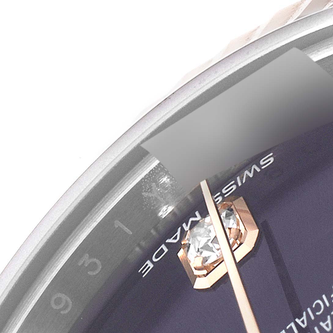 This close-up shows the dial and bezel of a Rolex Datejust 279171 Women's Steel and Gold (two tone) Blue Dial 279171 Women's Steel and Gold (two tone) Blue Dial, highlighting the Swiss Made label and diamond hour marker.