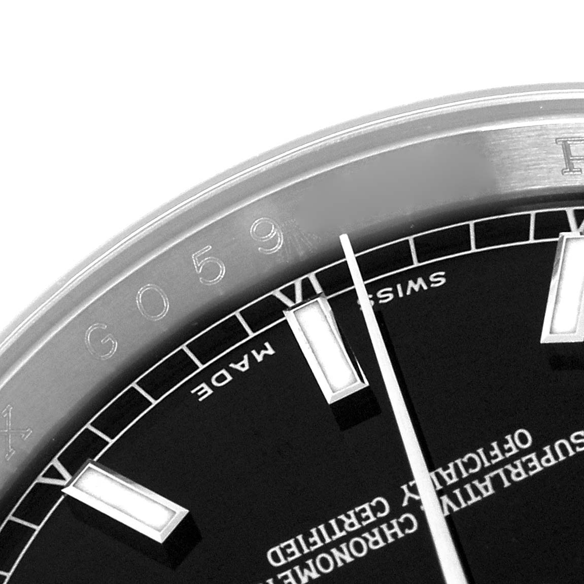 The image shows a close-up of the dial and partial bezel of a Rolex Datejust 116200 Men's Stainless Steel Black Dial 116200 Men's Stainless Steel Black Dial watch, highlighting the hour markers and text.