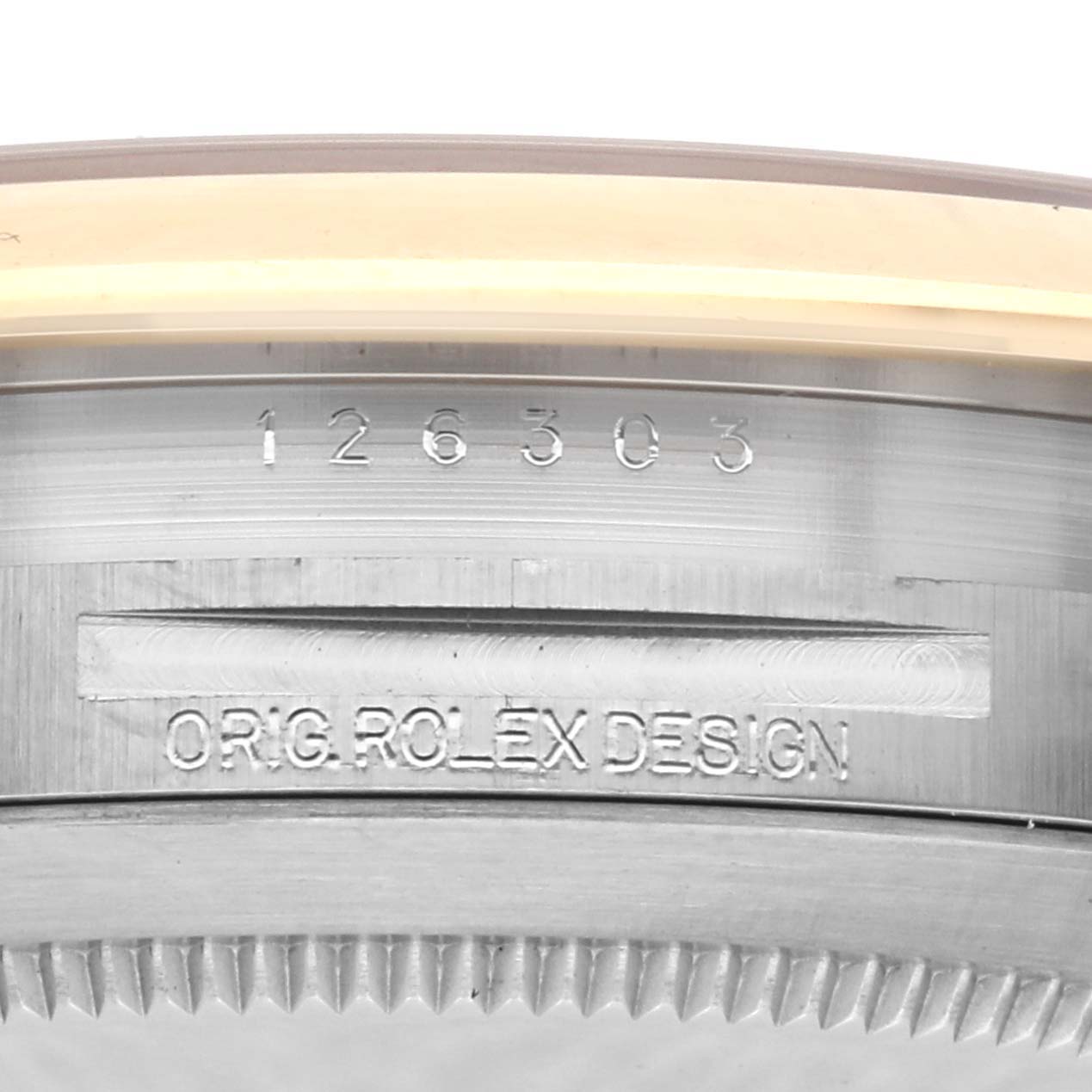 The image shows a close-up of the side of the Rolex Datejust 41 126303 Men's Steel and Gold (two tone) Grey Dial 126303 Men's Steel and Gold (two tone) Grey Dial, highlighting the engraved model number and branding.