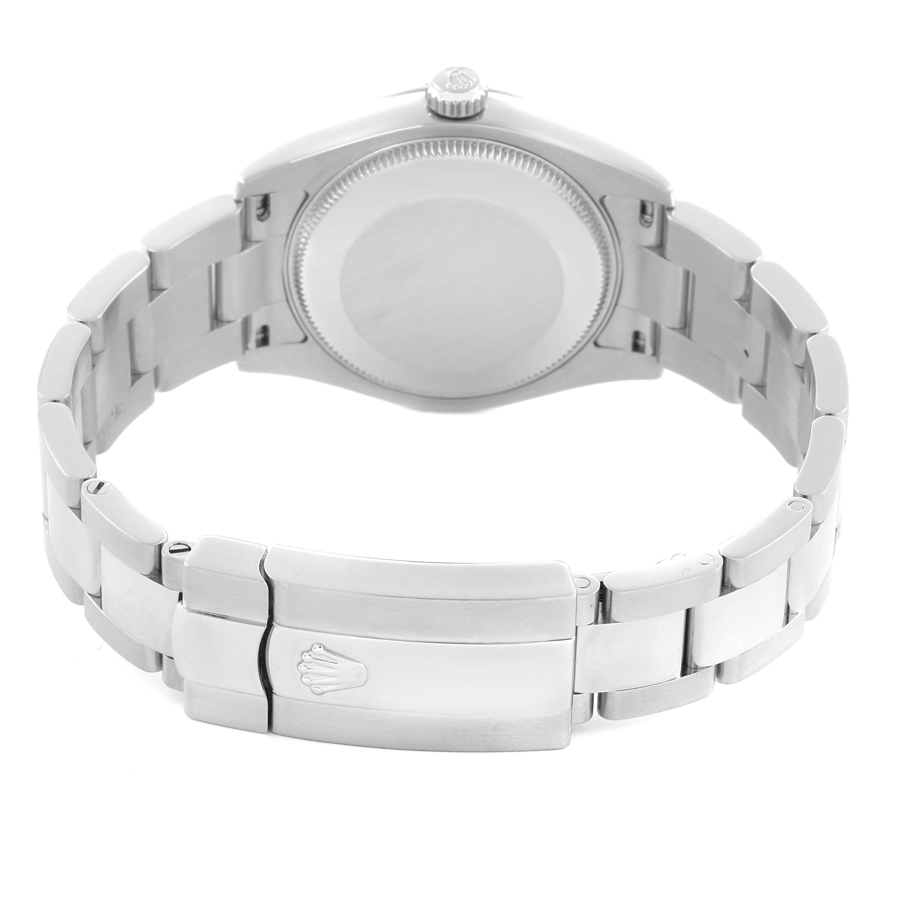 The Rolex Mid-Size 178274 Women's Stainless Steel Silver Dial 178274 Women's Stainless Steel Silver Dial watch is shown from the back, highlighting the case back, bracelet, and clasp.