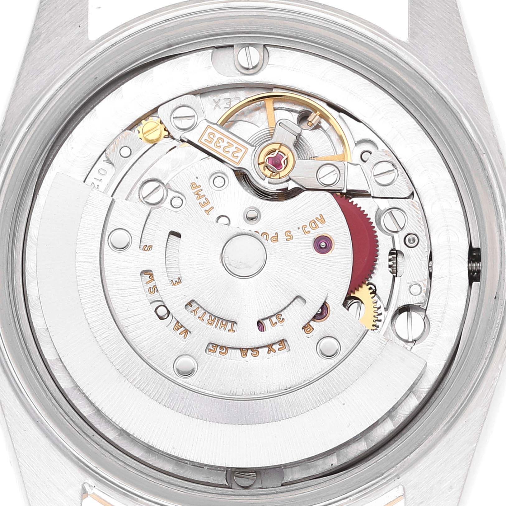 This image shows the movement of a Rolex Mid-Size 78273 Women
s Steel and Gold (two tone) Champagne Dial 78273 Women
s Steel and Gold (two tone) Champagne Dial model from a top-down angle, highlighting its inner mechanics and rotor.
