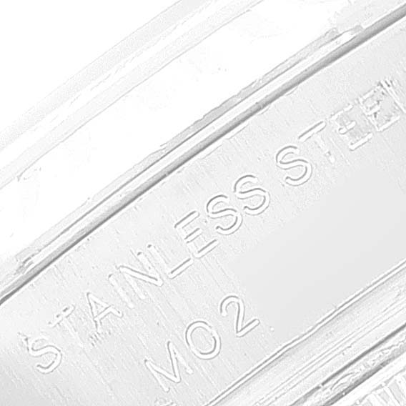 This close-up image shows part of the stainless steel back of a Rolex Datejust 179174 Women's Stainless Steel White Dial 179174 Women's Stainless Steel White Dial watch.