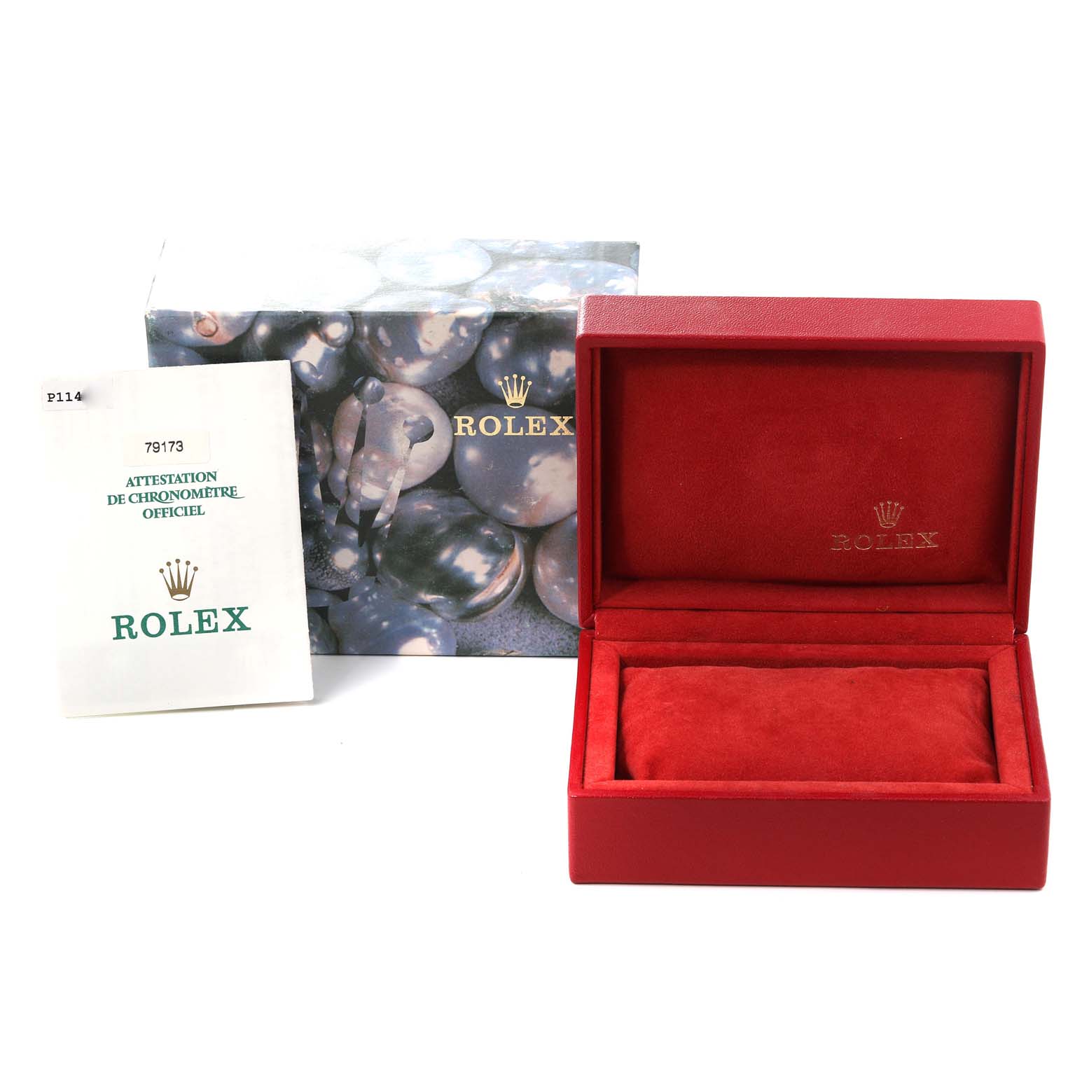 The image shows the packaging and accessories for a Rolex Datejust 79173 Women's Steel and Gold (two tone) Champagne Dial 79173 Women's Steel and Gold (two tone) Champagne Dial, including a box and an official chronometer certification.