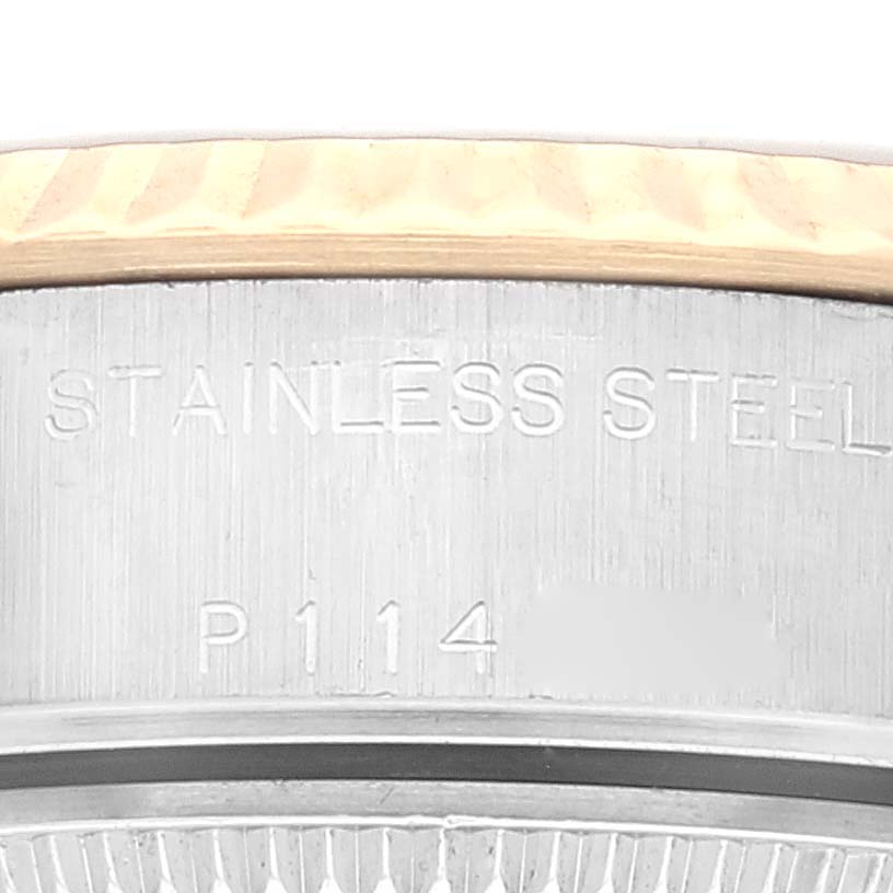 This image shows a close-up of the stainless steel outer case with engraved text of the Rolex Datejust 79173 Women's Steel and Gold (two tone) Champagne Dial 79173 Women's Steel and Gold (two tone) Champagne Dial model.
