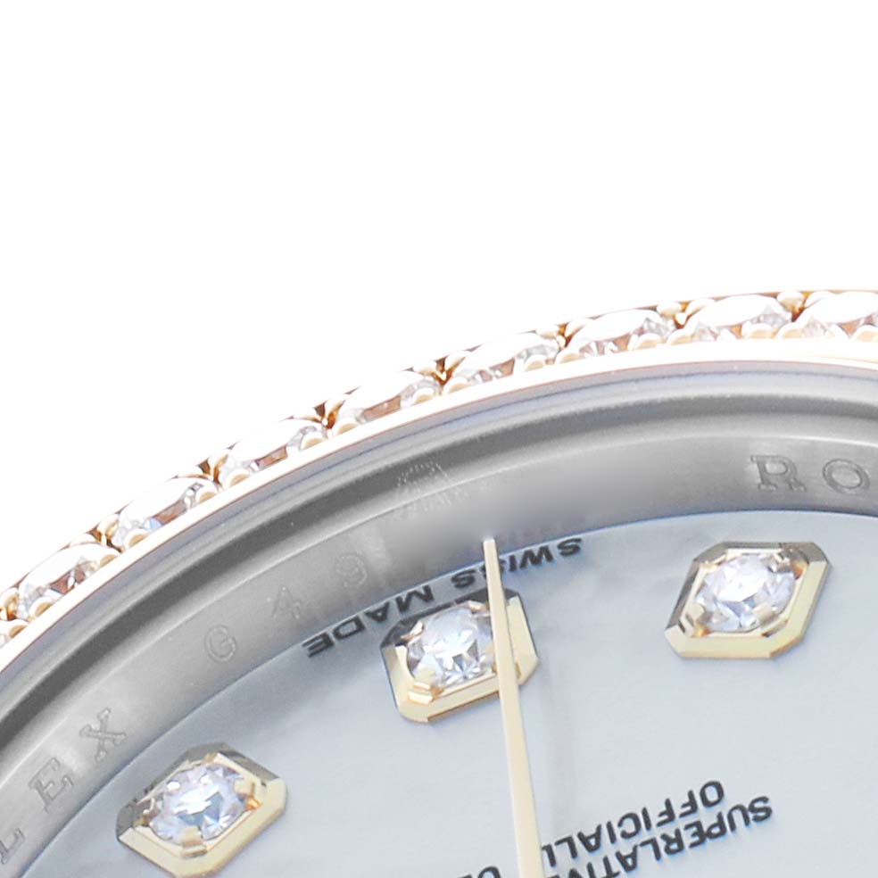 The image shows a close-up of a Rolex Datejust 179383 Women's Steel and Gold (two tone) Mother of Pearl Dial watch, featuring its jeweled bezel and diamond hour markers.