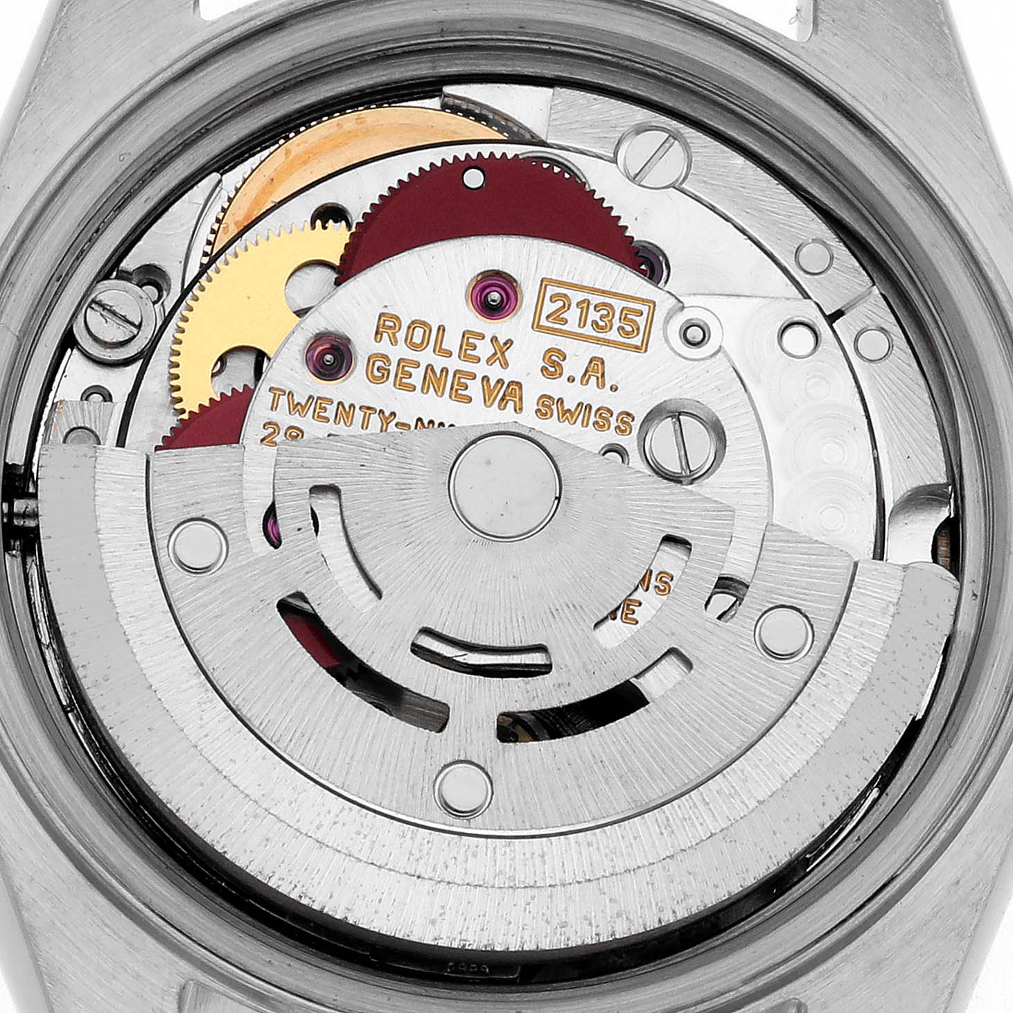 The image shows the movement of a Rolex Datejust 69163 Women's Steel and Gold (two tone) Grey Dial 69163 Women's Steel and Gold (two tone) Grey Dial watch from the back, highlighting its intricate gears and rotor.