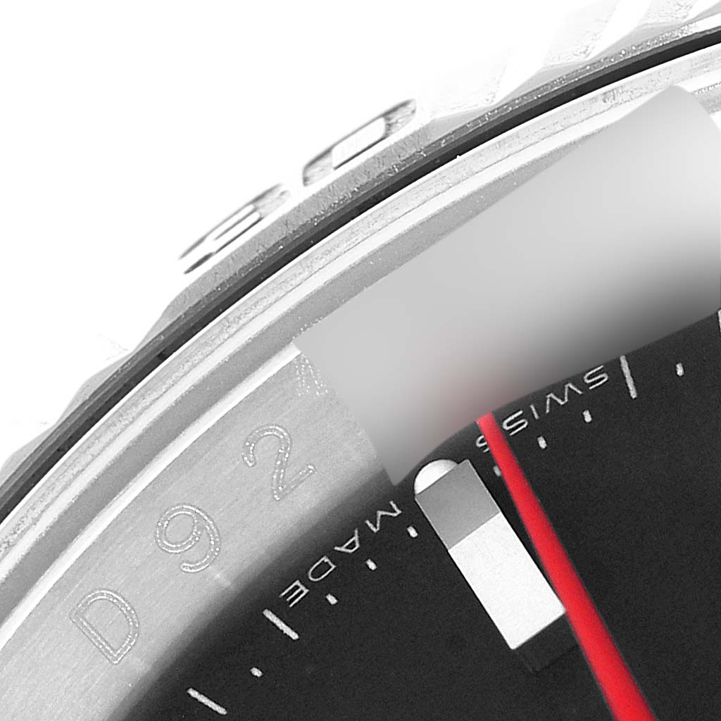 The image shows a close-up of the bezel and part of the dial of a Rolex Turn-o-Graph 116264 Men's Stainless Steel Black Dial 116264 Men's Stainless Steel Black Dial watch.