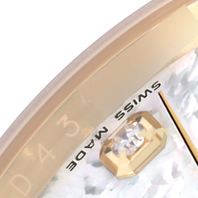 The image shows a close-up of the dial and diamond marker on the Rolex Datejust 116238 Men's Yellow Gold Mother of Pearl Dial 116238 Men's Yellow Gold Mother of Pearl Dial, highlighting the "Swiss Made" text.